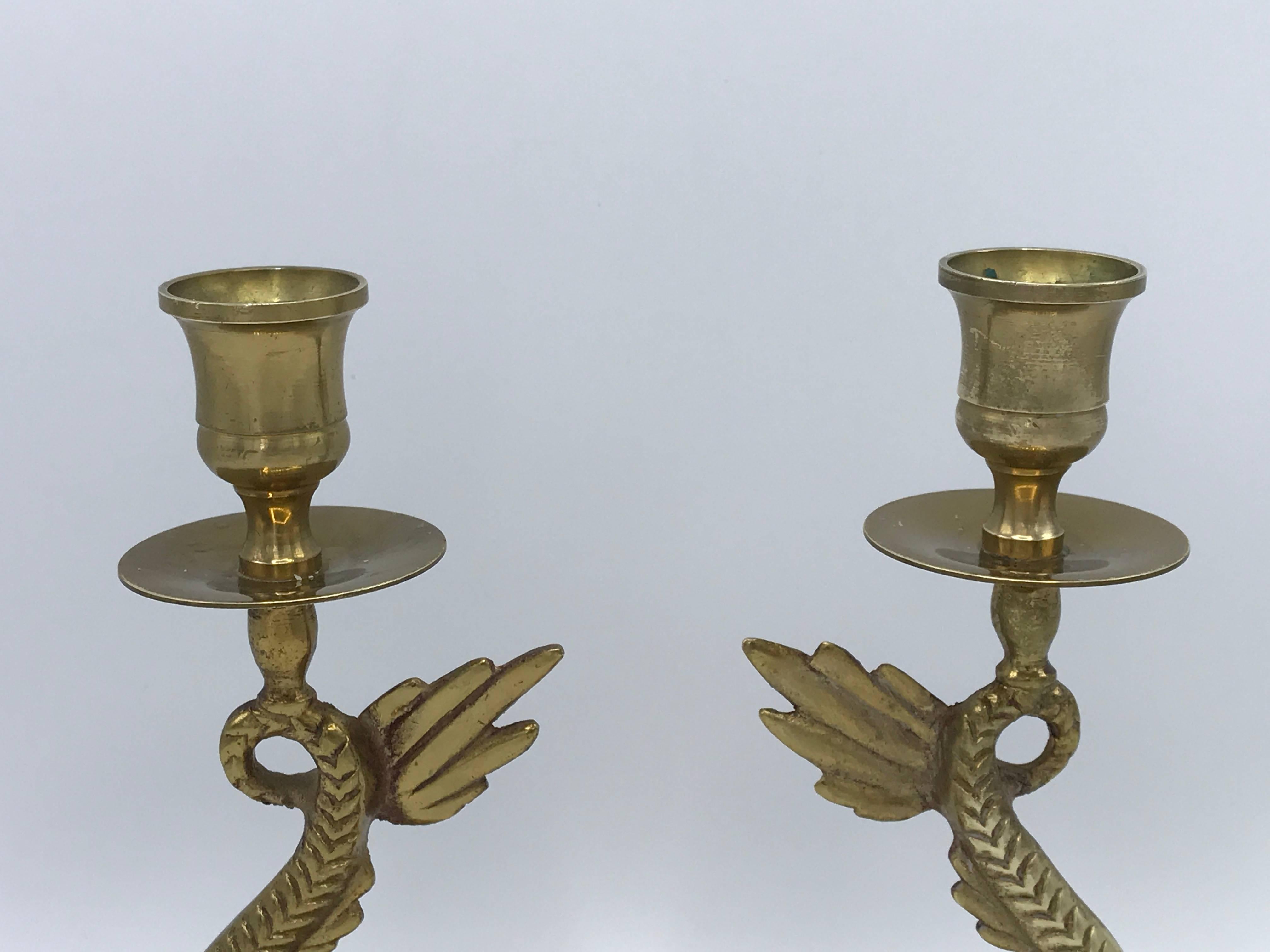 Offered is a fabulous, pair of 1960s brass koi fish candlesticks. Solid-brass, heavy.