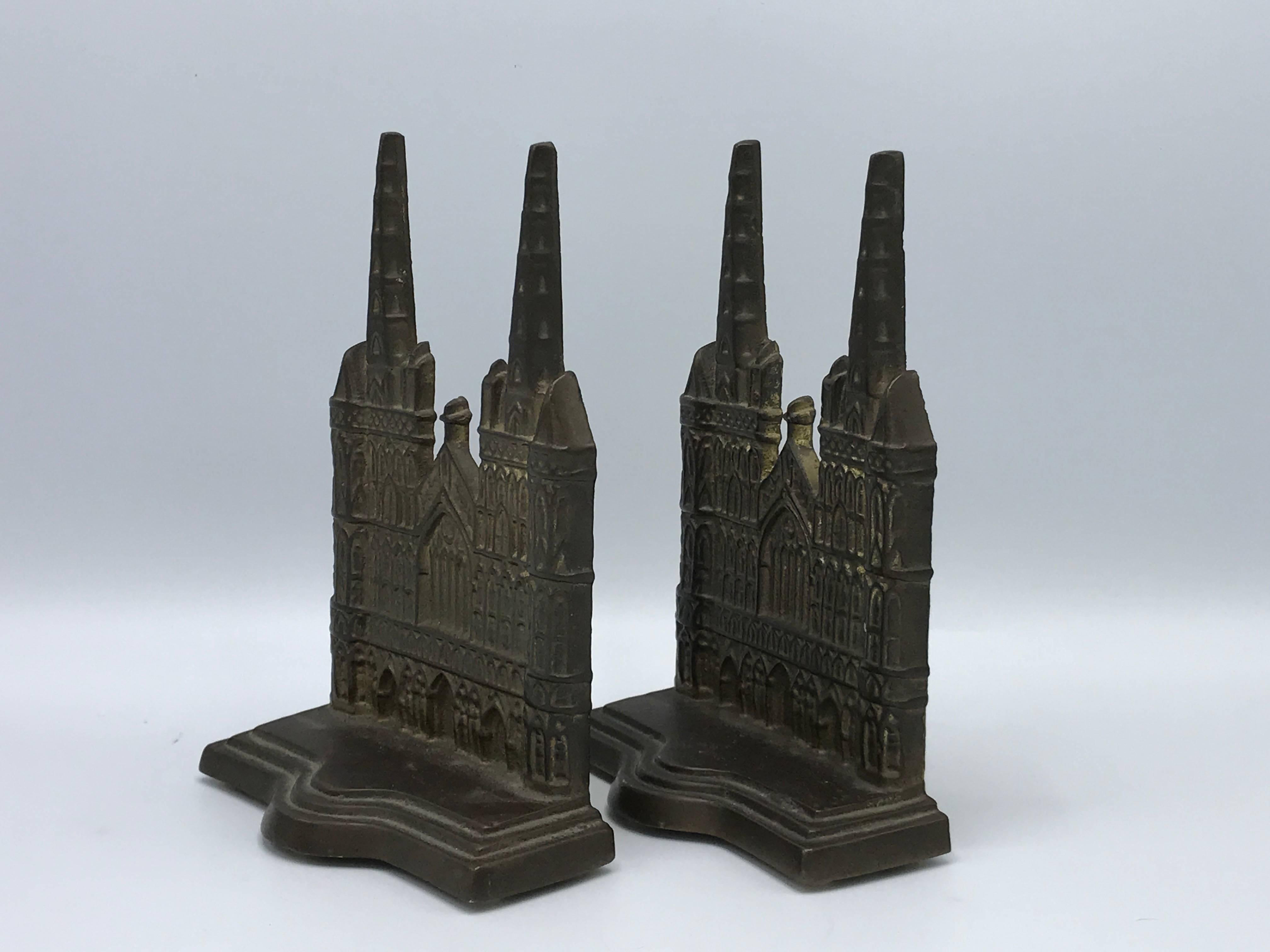 Offered is a gorgeous, pair of 1960s cast-bronze Litchfield Cathedral Church bookends. Incredibly detailed. Marked on backside of each. Heavy.