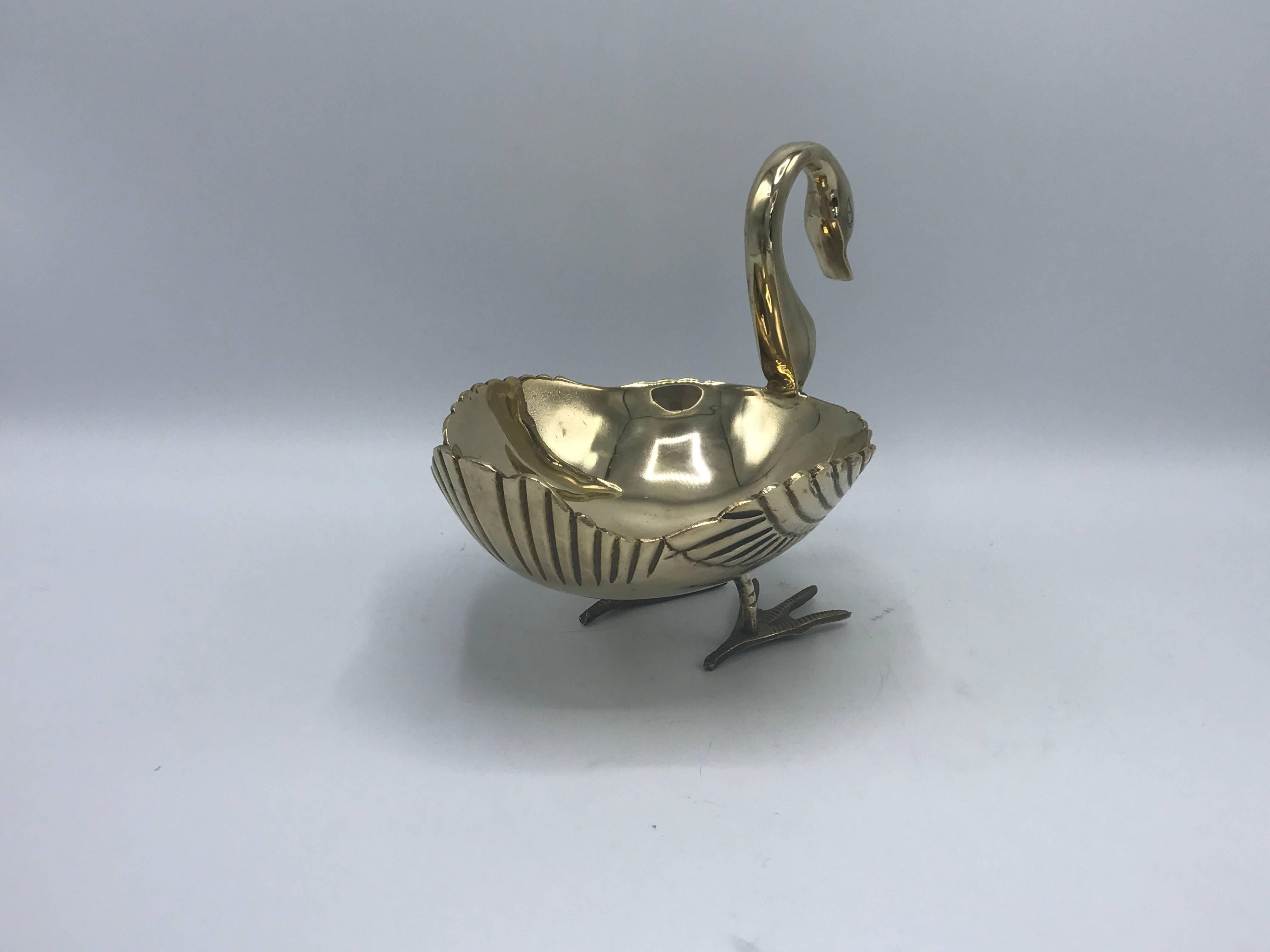 Offered is a gorgeous, 1970s Maison Jansen style brass swan sculpture catchall bowl.