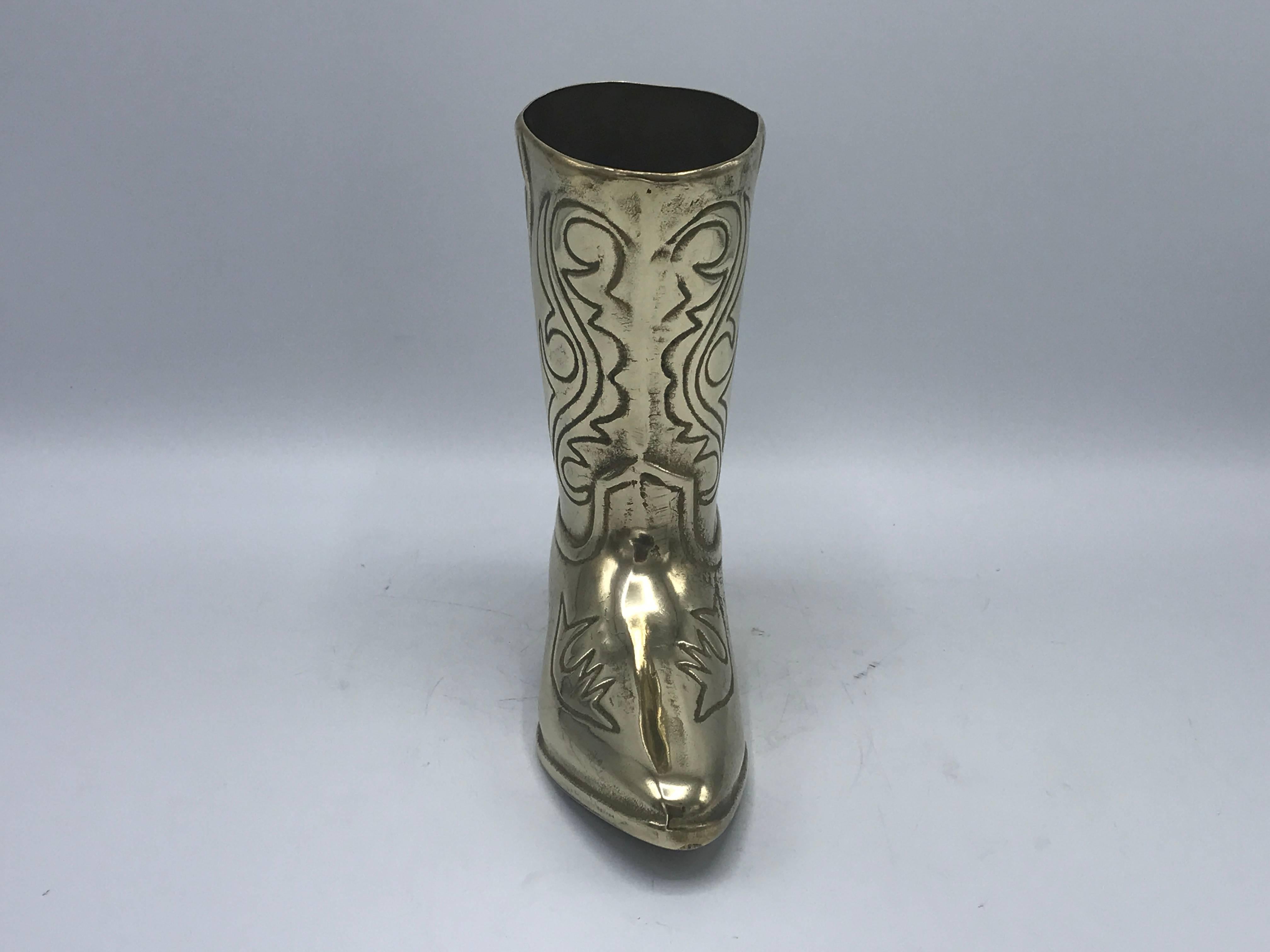 Offered is a beautiful, 1970s brass cowboy boot sculptural cachepot vase. Heavy.
