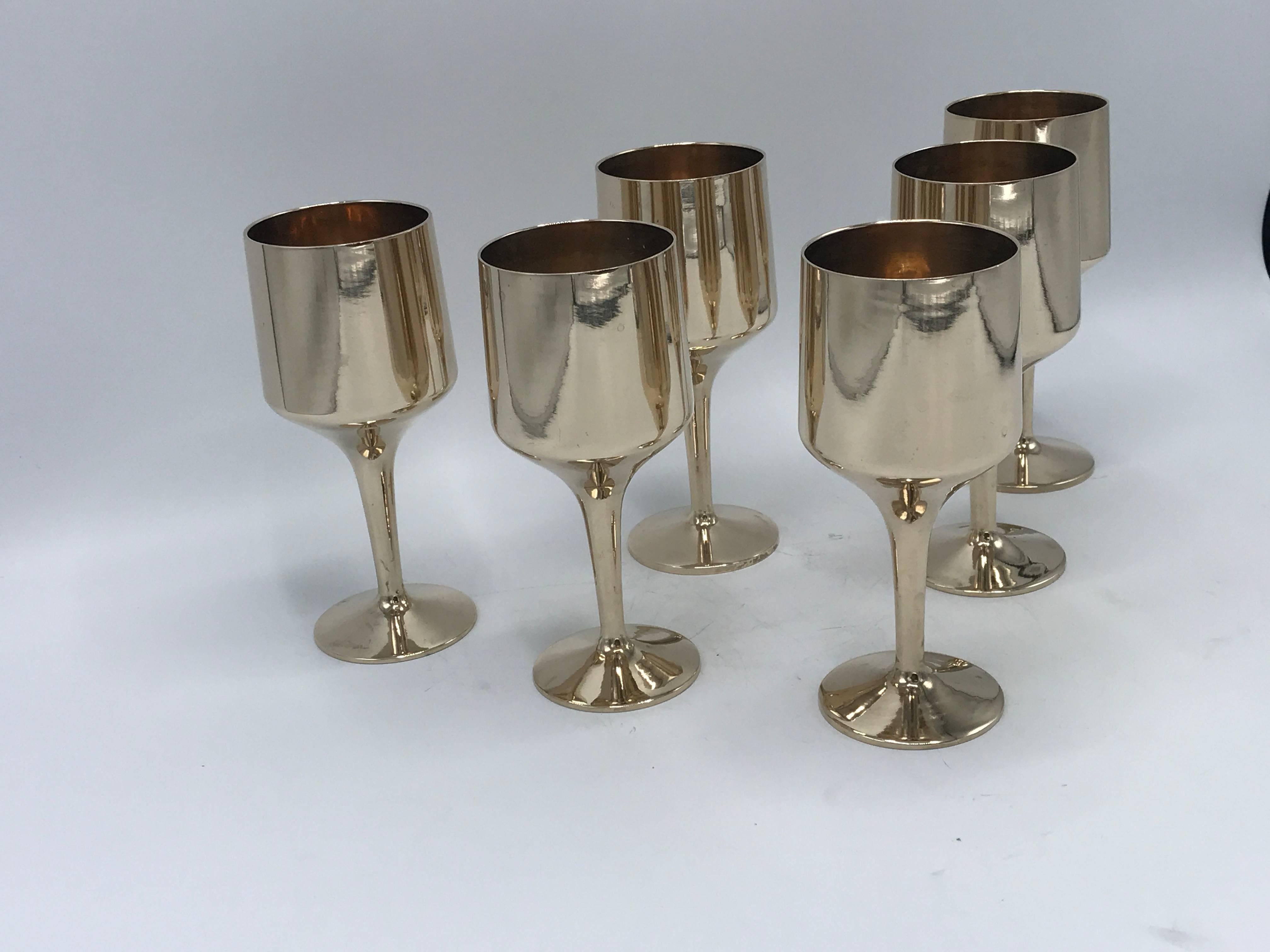 Offered is a fabulous, set of six, 1970s Italian solid-brass goblet wine glasses. Heavy.
