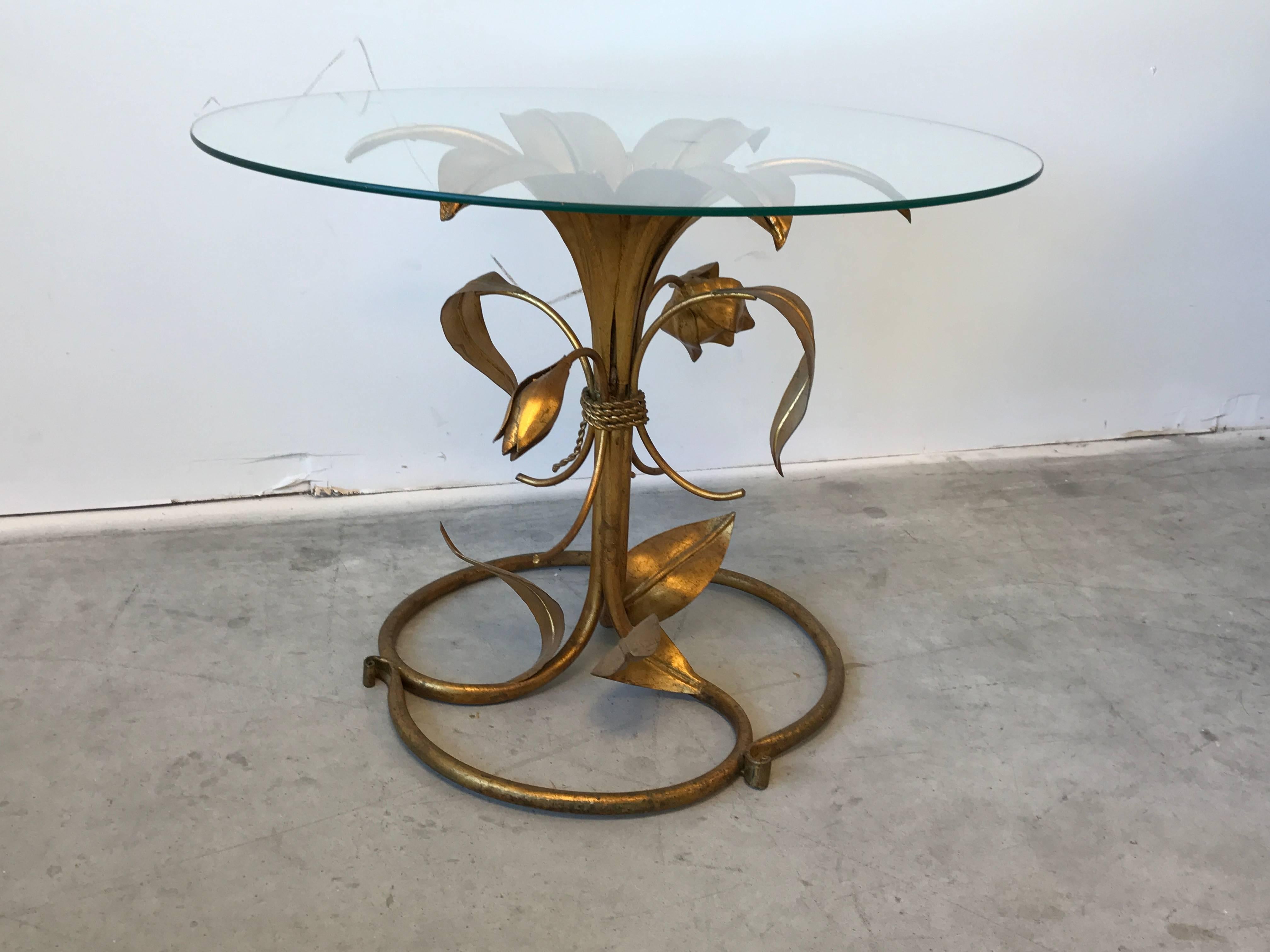 Offered is a fabulous, 1950s Italian gilded Arthur Court style lily side table. Measure: Base can hold 18