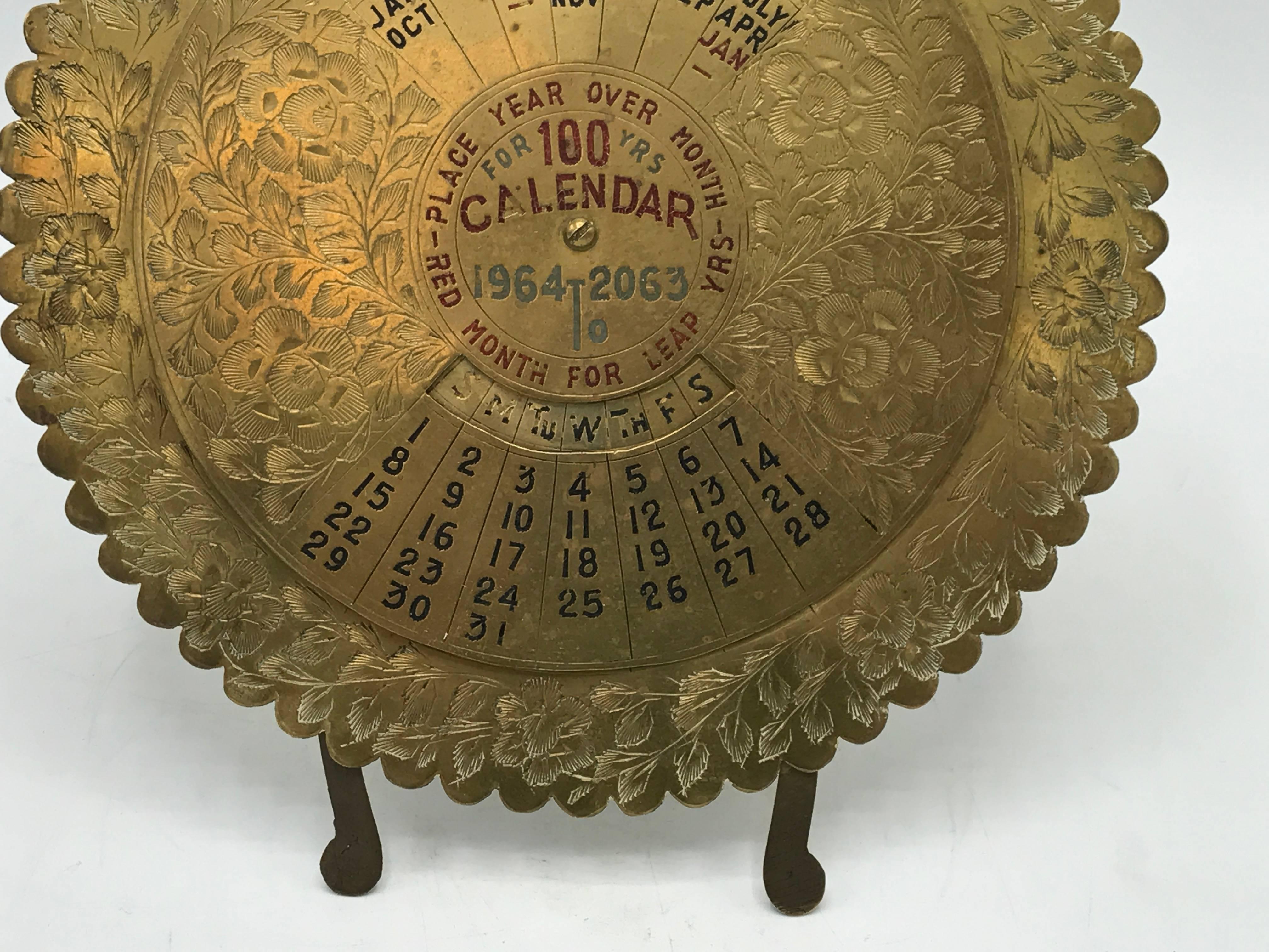 vintage brass 100 year calendar