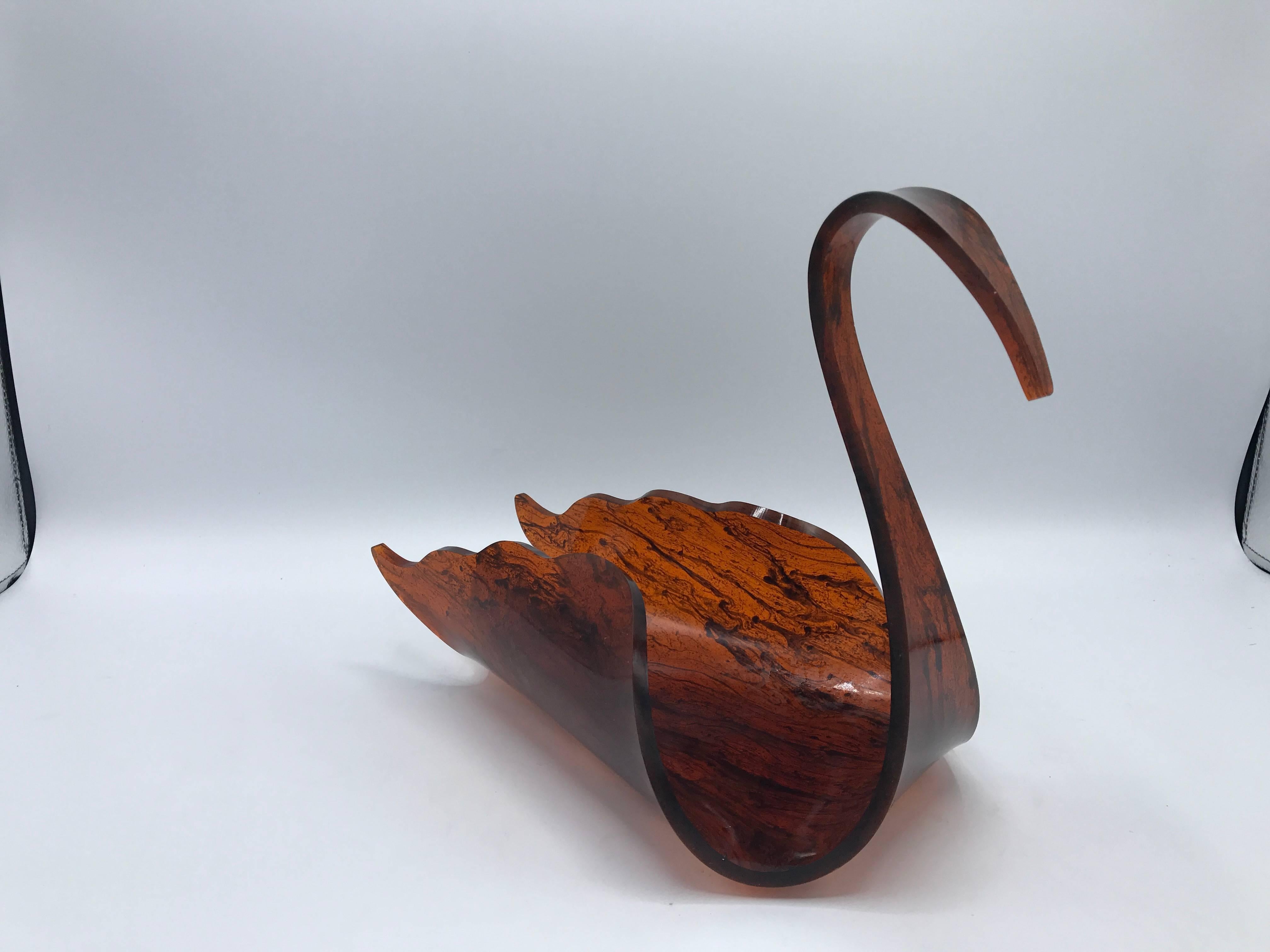 Offered is an exquisite, 1970s Italian tortoise Lucite swan sculpture. The piece doubles as a decorative bowl.
