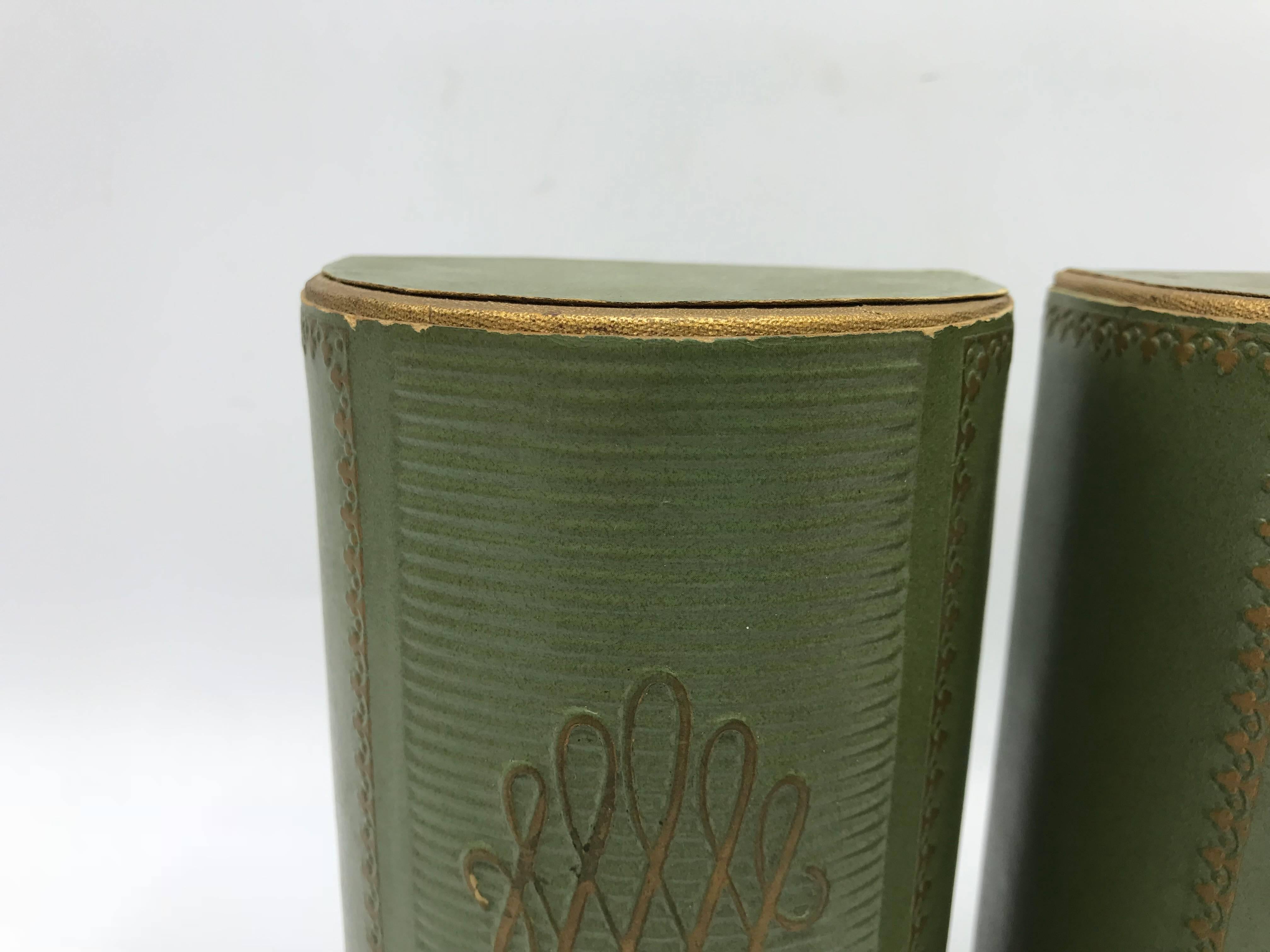 Offered is a fabulous, pair of 1940s Italian green leather bookends with embossed and hand-painted gold detailing.