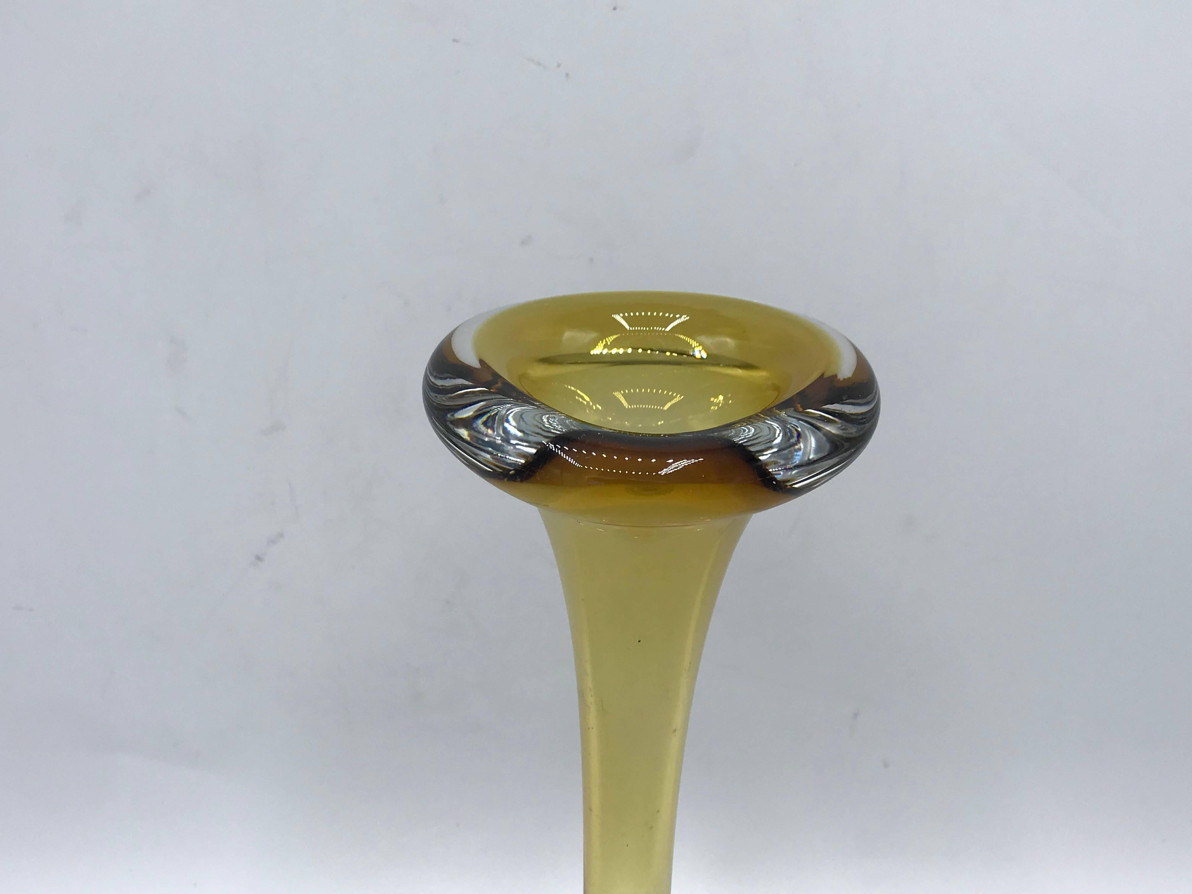 Offered is a beautiful, 1960s Italian Murano glass bud vase. The piece has a gold, yellow, and muted-orange coloring.