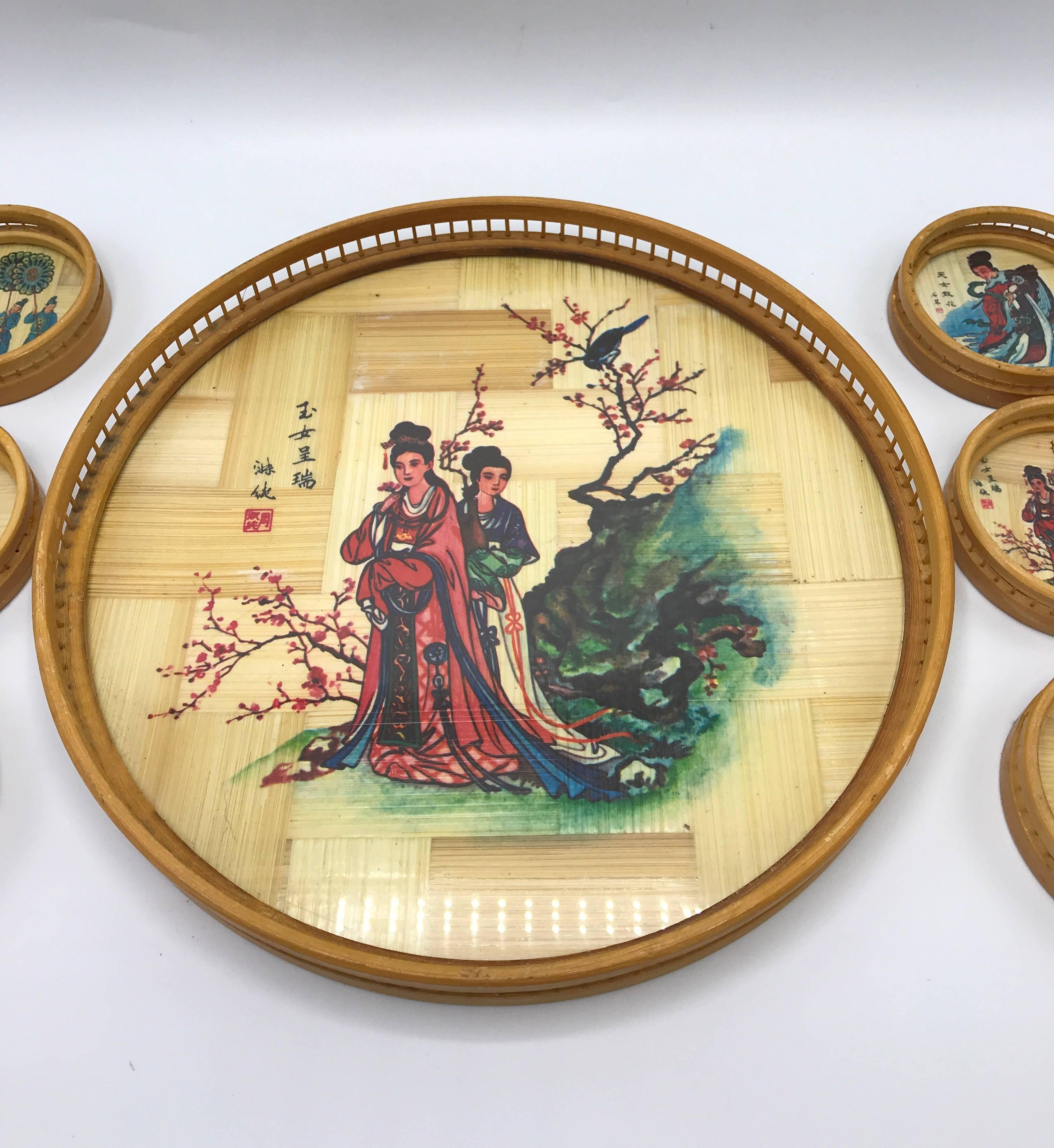 Offered is a beautiful, 1970s bamboo and glass coaster and tray set with an Asian Geisha motif. Set includes, six coasters and one tray. 

Measures: Coaster: 0.75” x 3.5”
Tray: 1.25” x 11.25”.