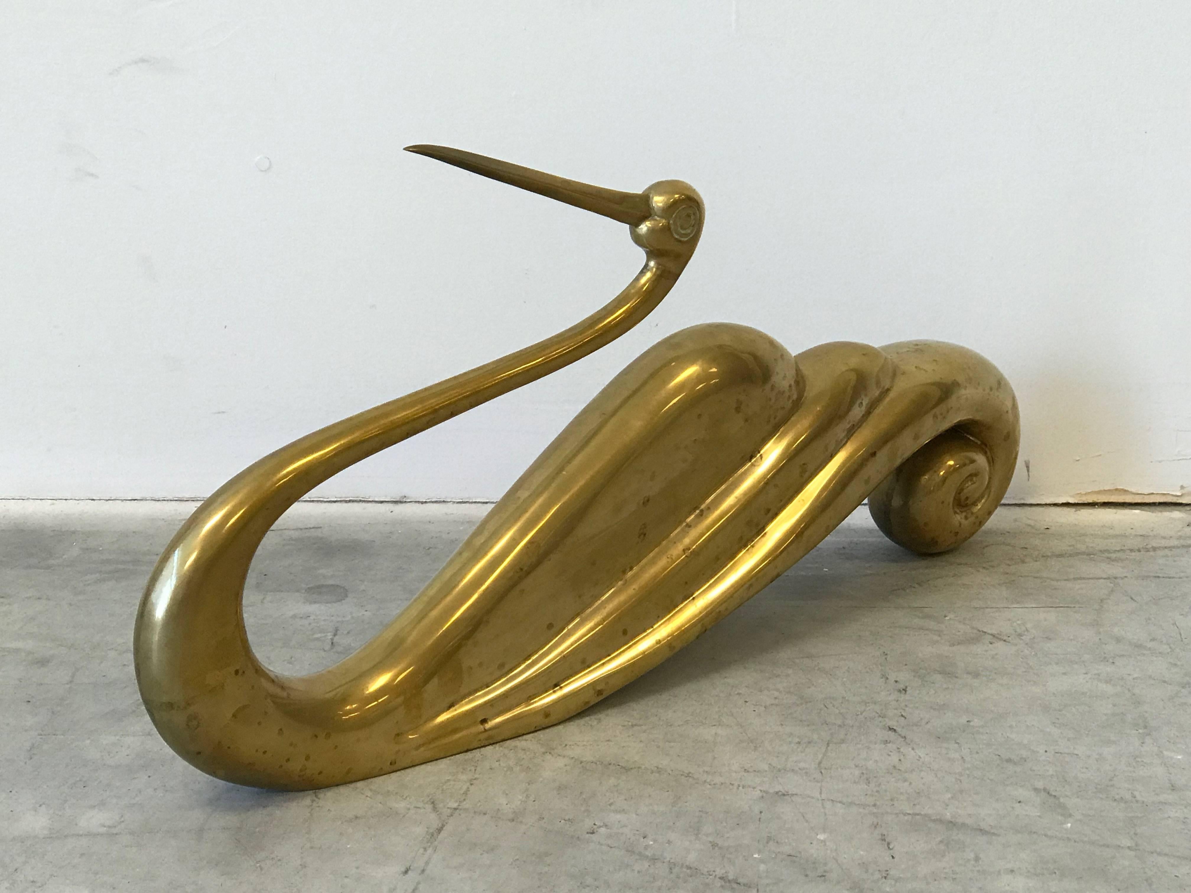 Offered is a stunning, 1950s modern, Art Deco style Italian brass bird sculpture. Either, swan or ibis. Heavy, solid-brass weighing 12.5 pounds.