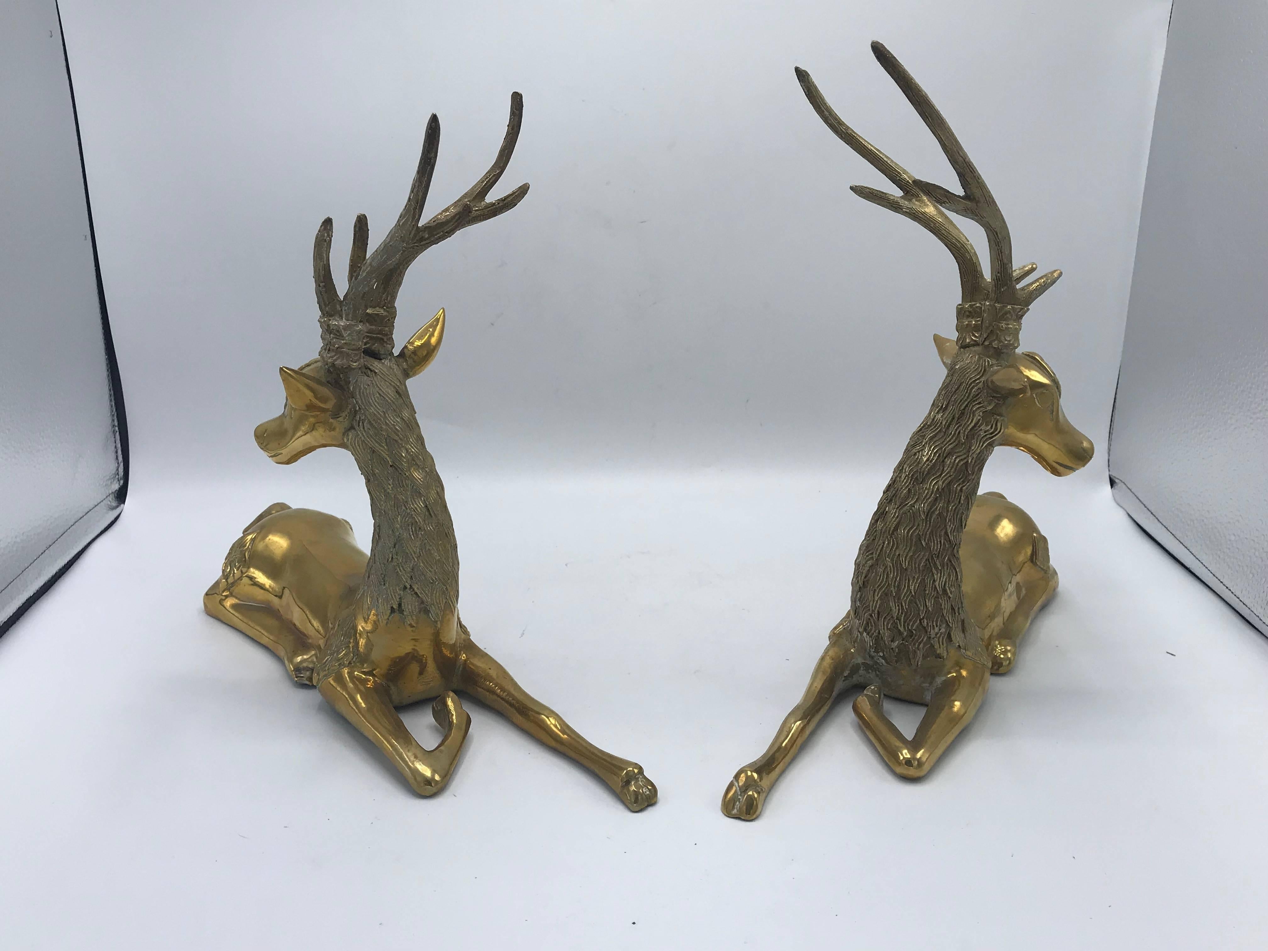 Offered is a fabulous, pair of 1970s Sarreid Ltd. brass deer sculptures. Heavy. Perfect as holiday decor! 