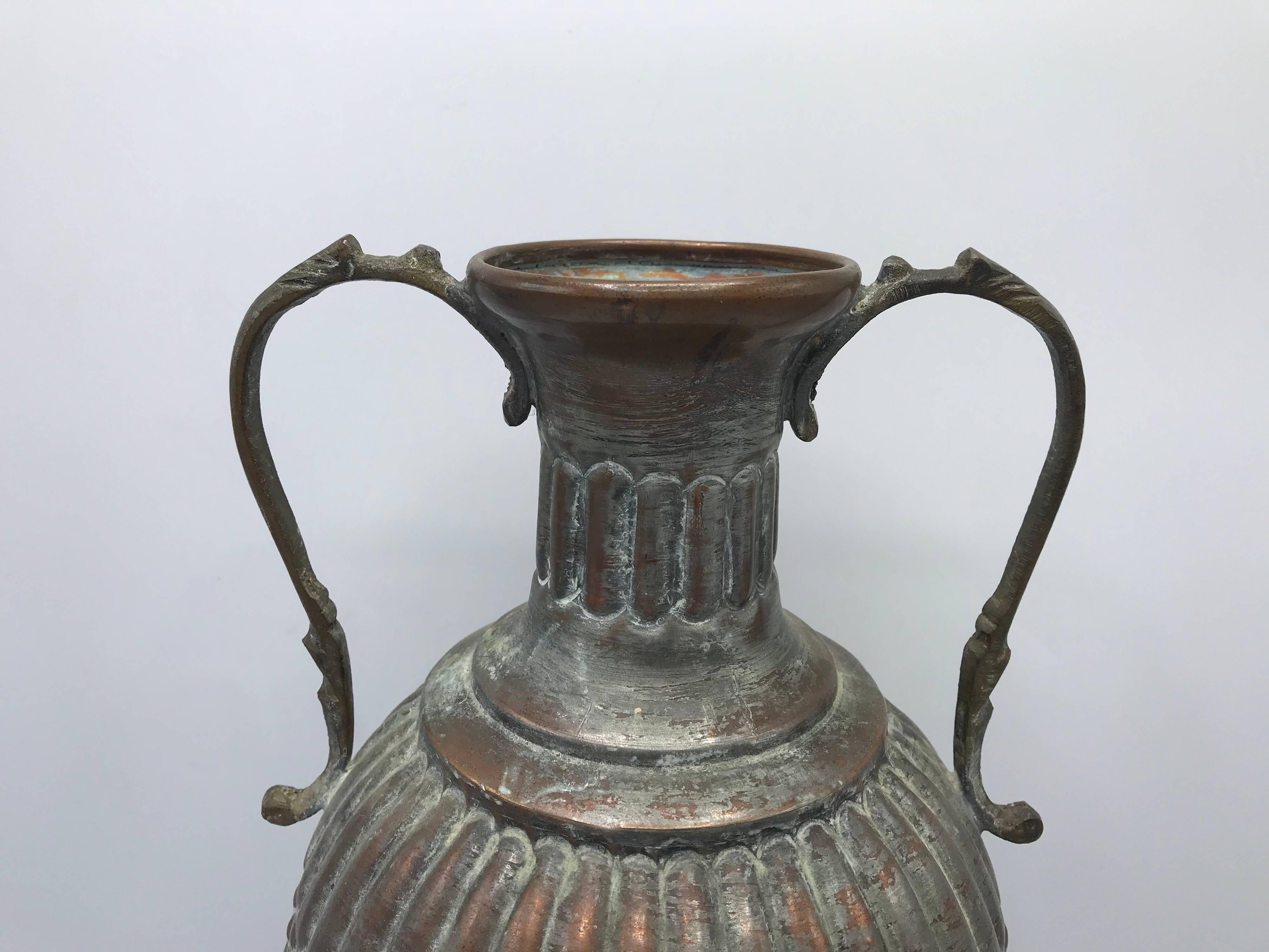 Listed is a stunning, 1950s copper urn with a lovely pewter wash finish. Exquisite condition!