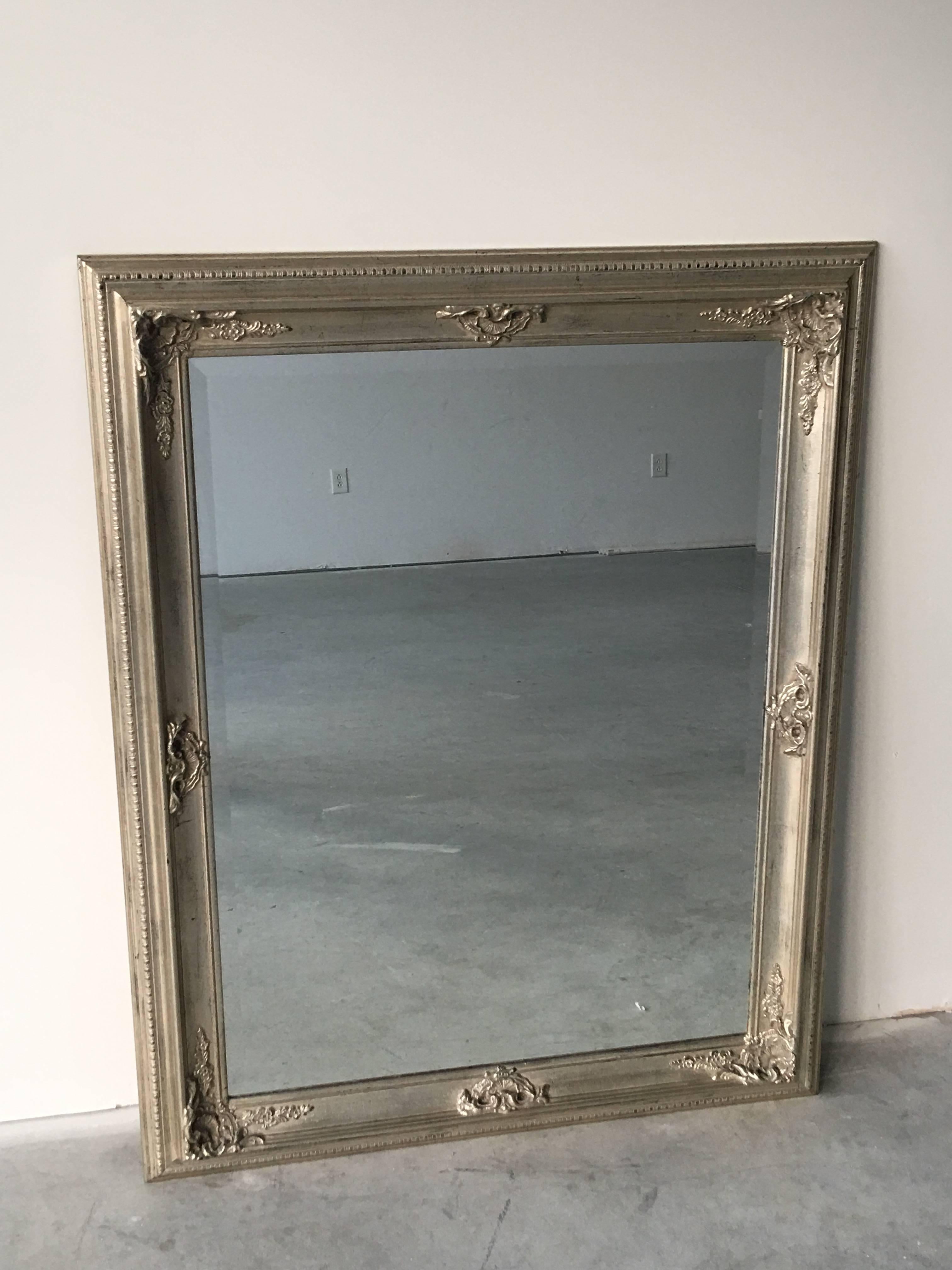 Offered is a fantastic, silver gilt mirror in the style of the 19th century. Wood frame.