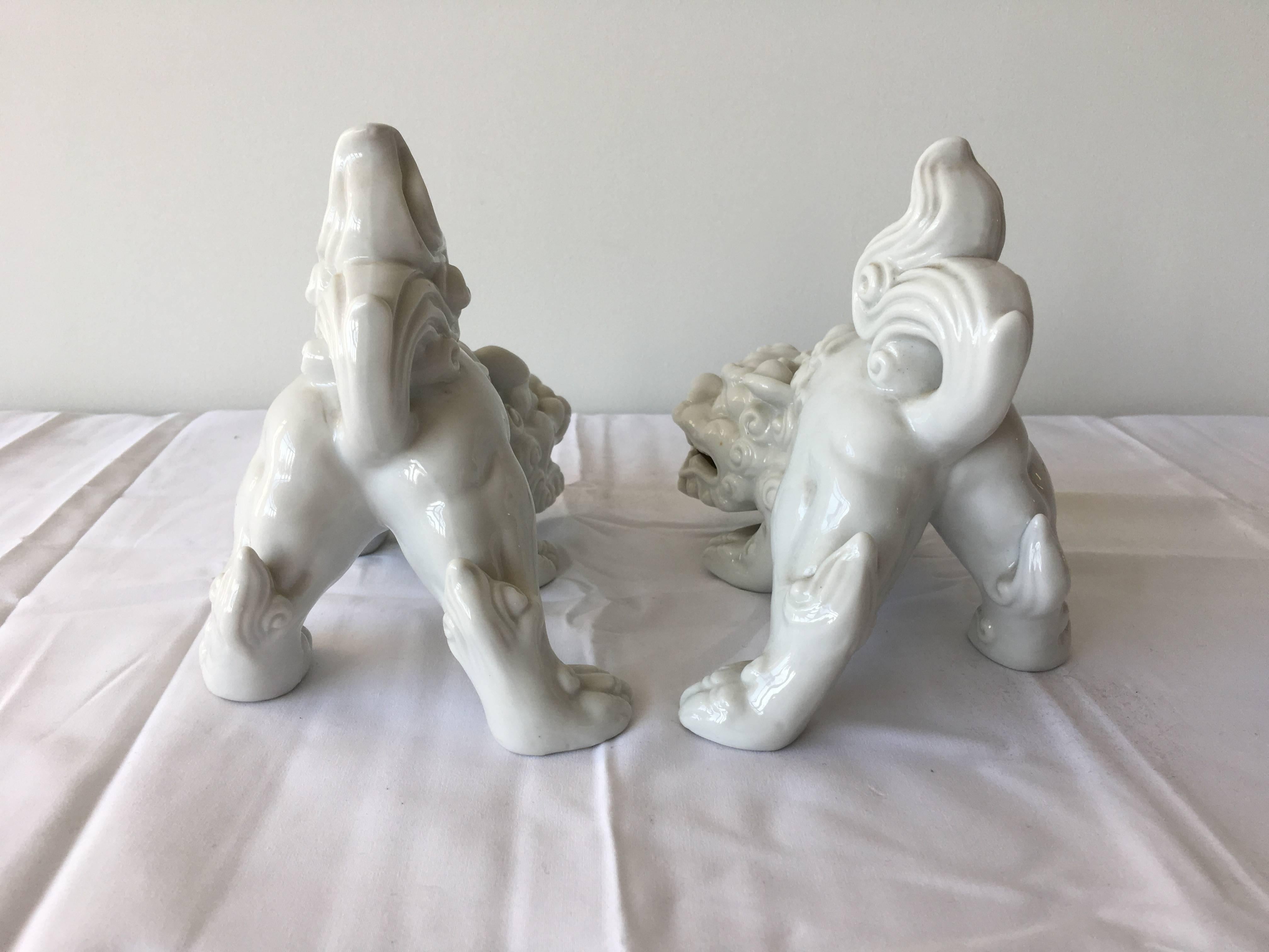 Polished Blanc De Chine Foo Dog Statues, Pair