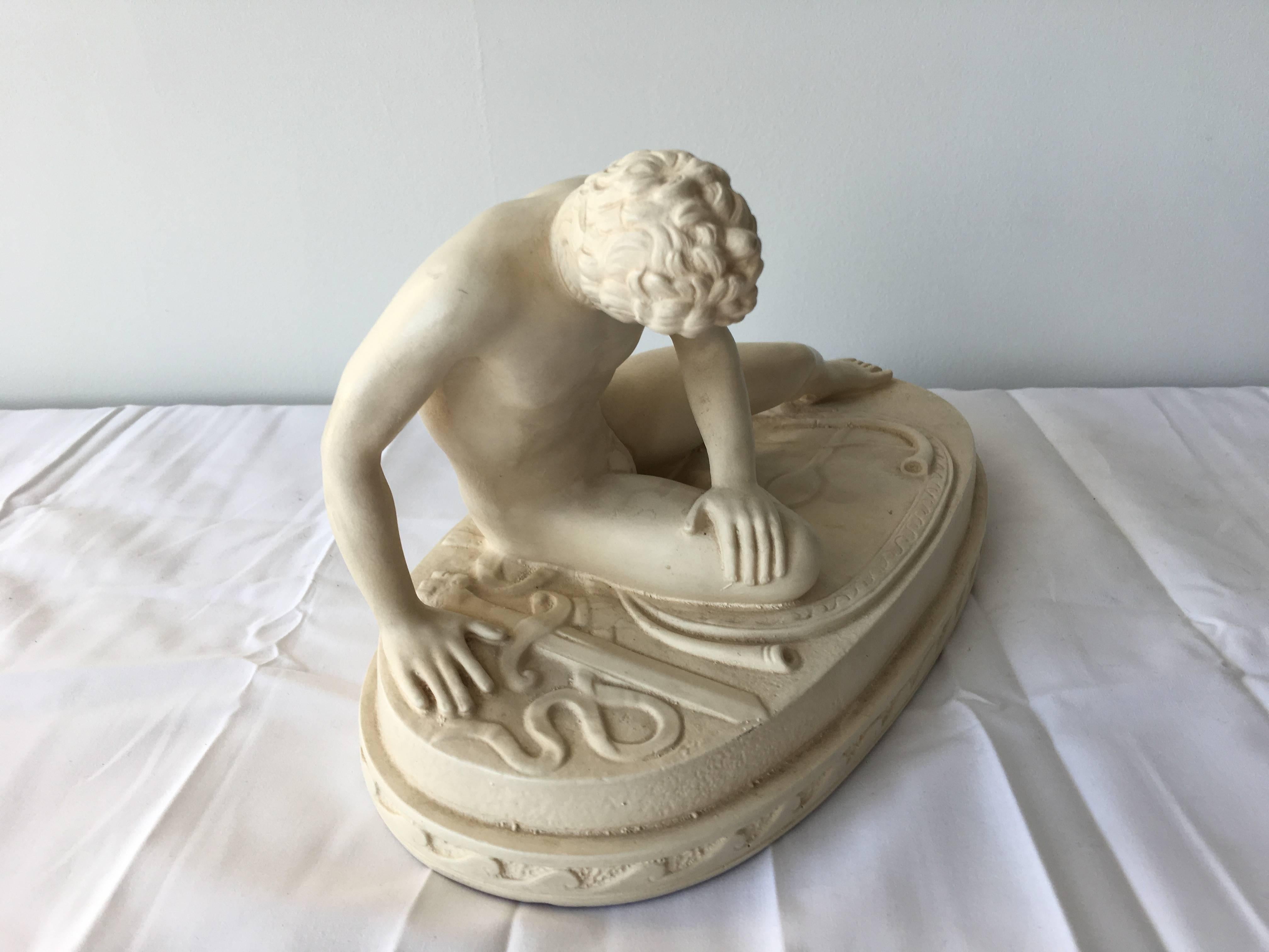 A 1950s Alexander Backer and Co. nude male statue.