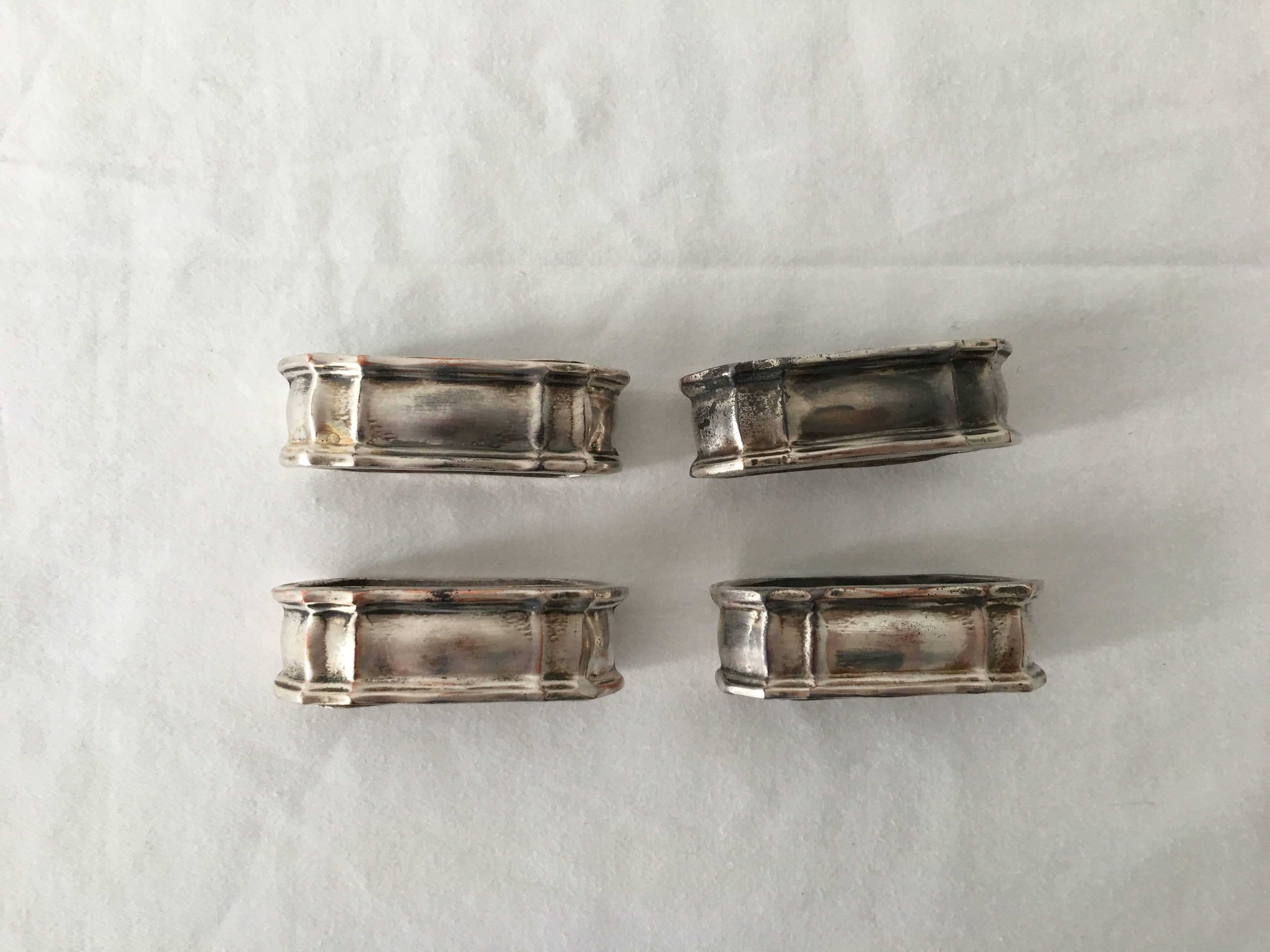 Offered is a stunning set of four, 1930's silver plated, oval, napkin rings. Weighted.