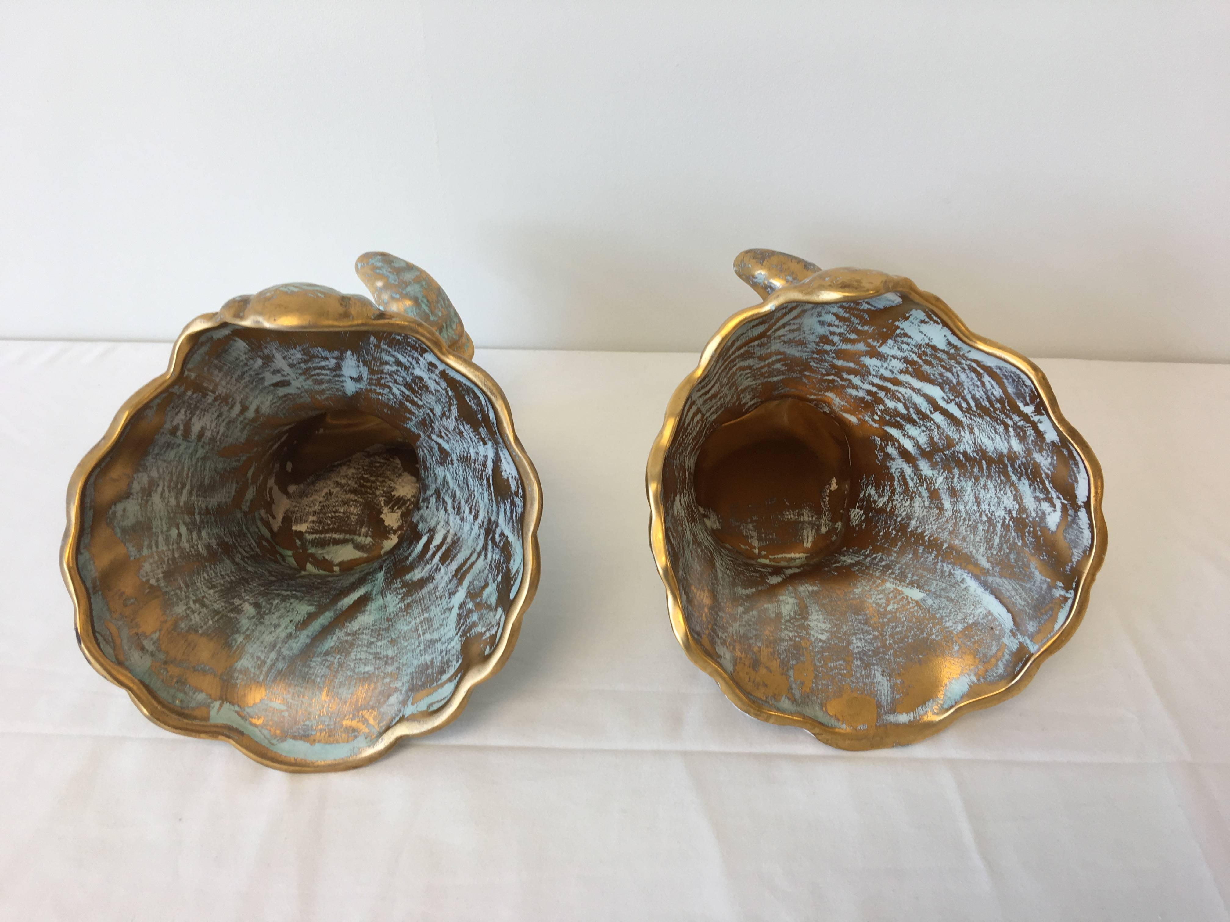 Offered is a stunning pair of gold and turquoise, Stangl Pottery cornucopias. They make great serving pieces, or a more unconventional use could be cache pots.