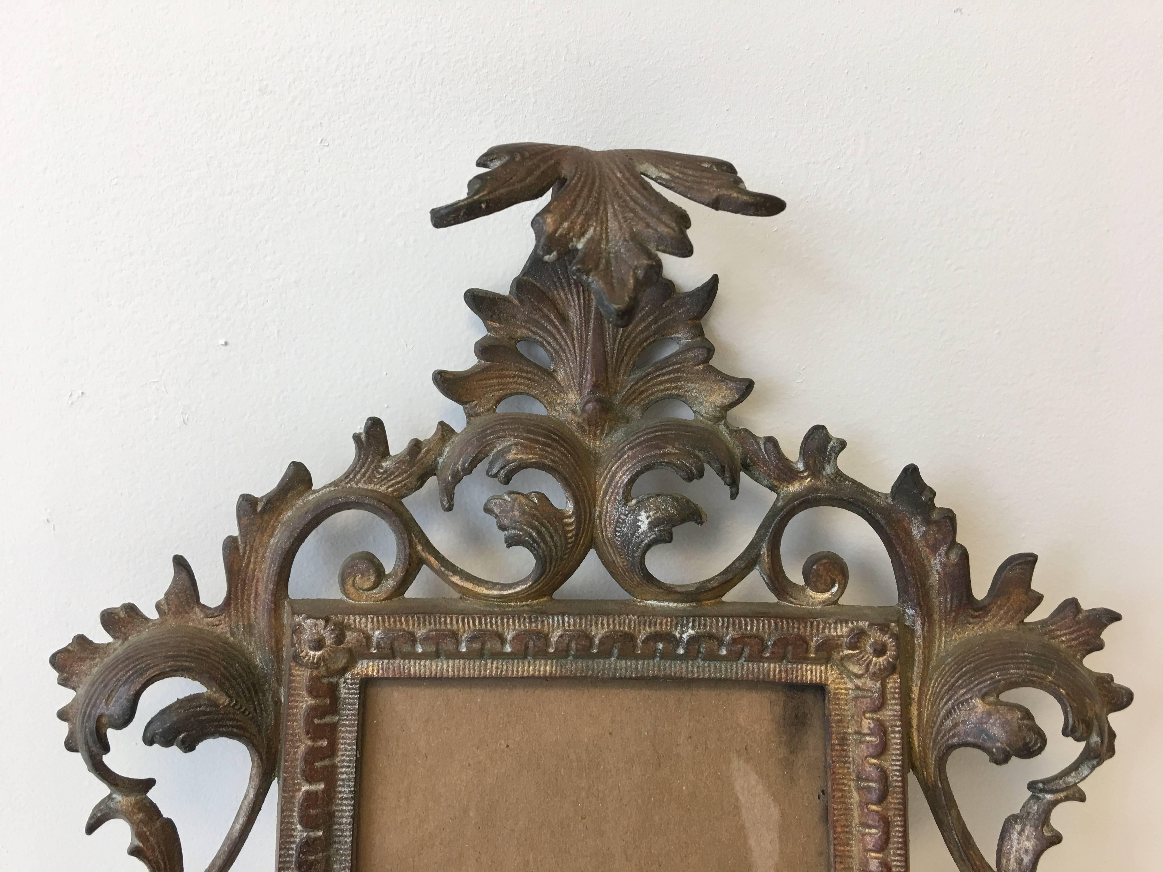 Offered is a stunning, 19th century Art Nouveau, bronze standing picture frame with immaculate detailing. Marked: 1894 on backside. Fits a 4