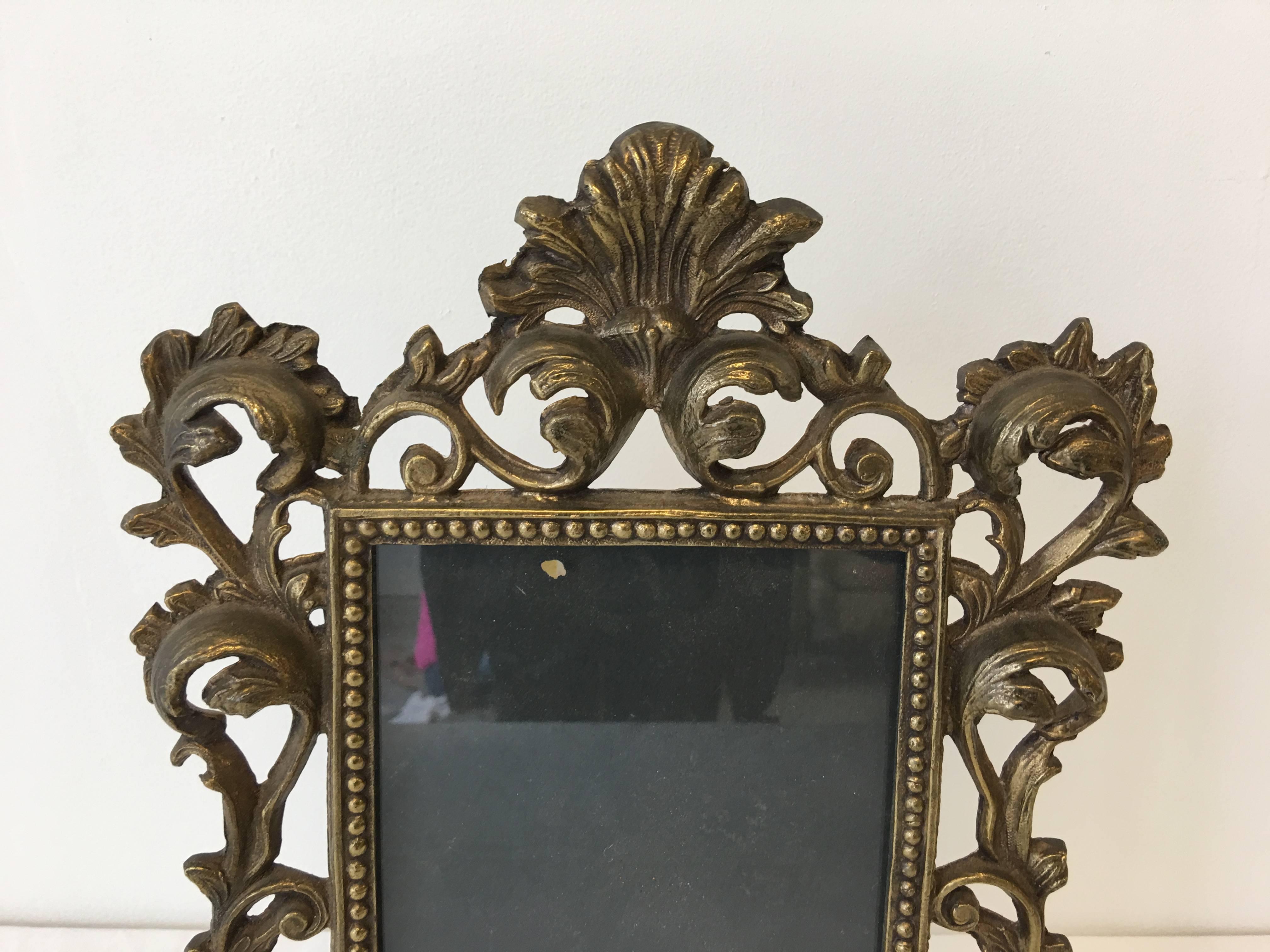 Offered is a fabulous, 19th century Art Nouveau, Louis XV style bronze standing picture frame with heavy detailing. Fits a 5" x 7" picture.