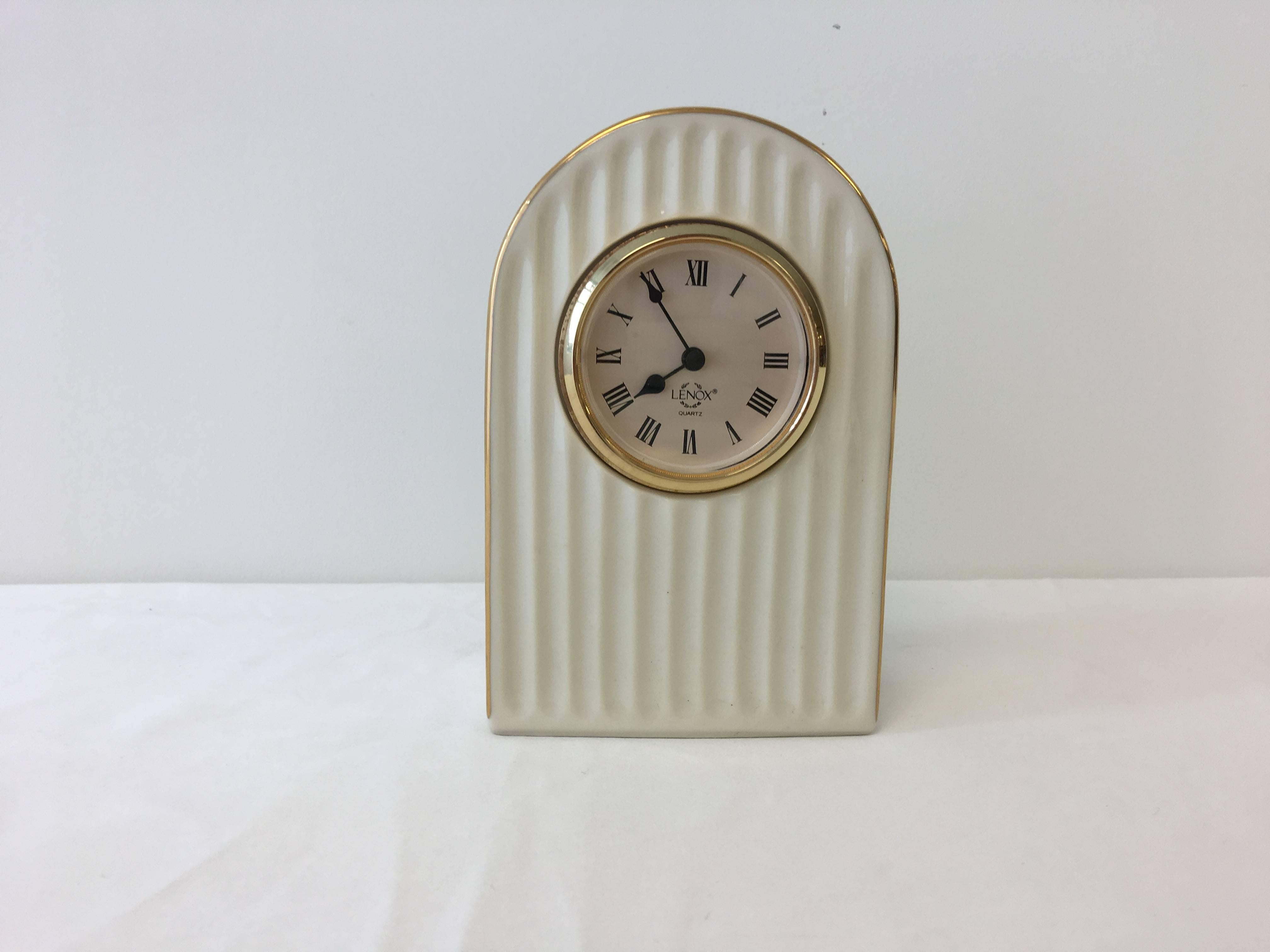 Offered is a beautiful, 20th century Lenox clock. Porcelain in an ivory color, with 24-karat gold trim. Represents an Art Deco style. Battery operated, excellent working condition.