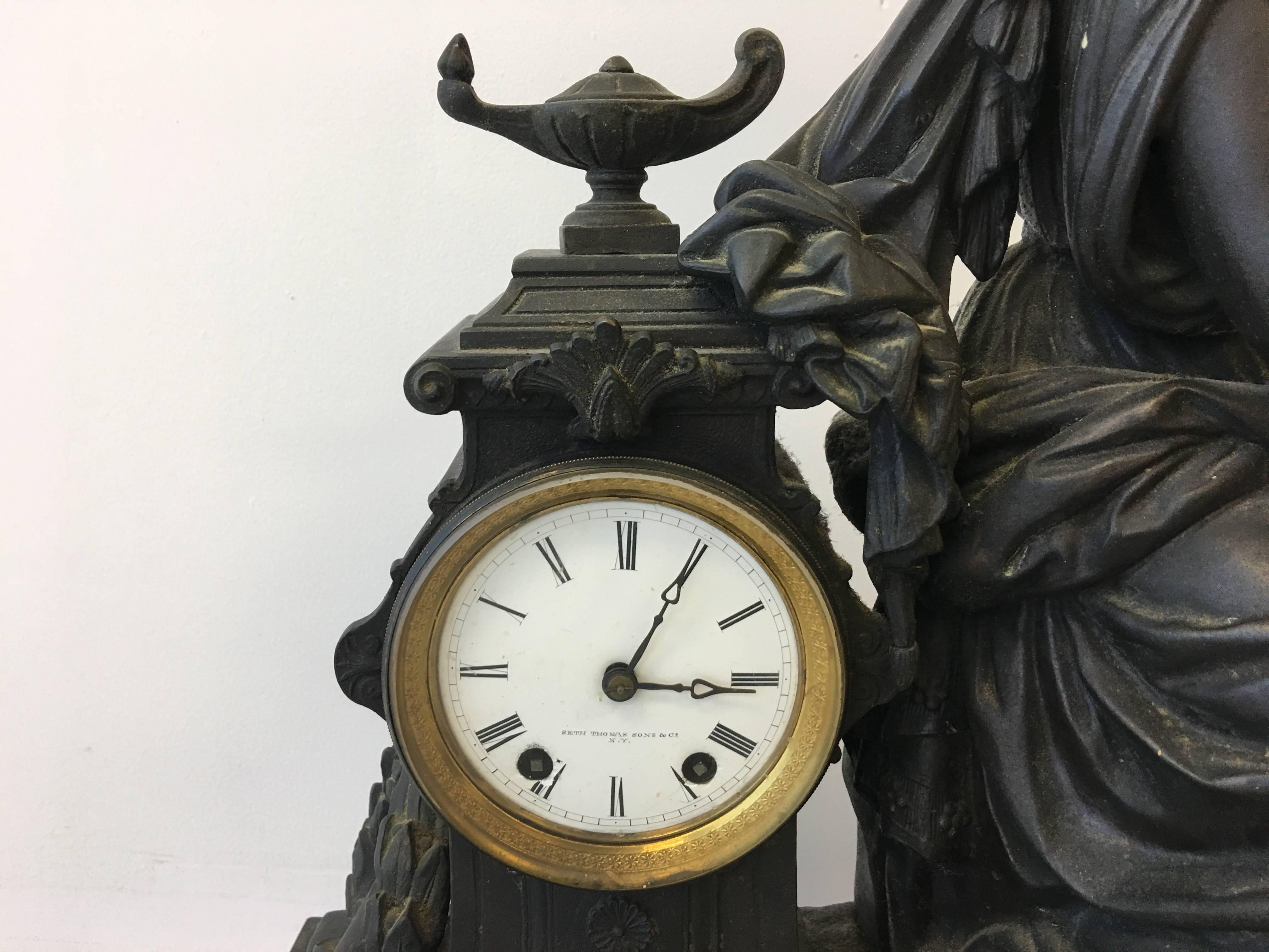 Offered is an absolute stunning, 1920s Art Deco, substantial Seth Thomas bronze female figure clock. Truly immaculate! Weighs approx. 65lbs. Backside has an opening door, revealing the wind up clock and bell.
