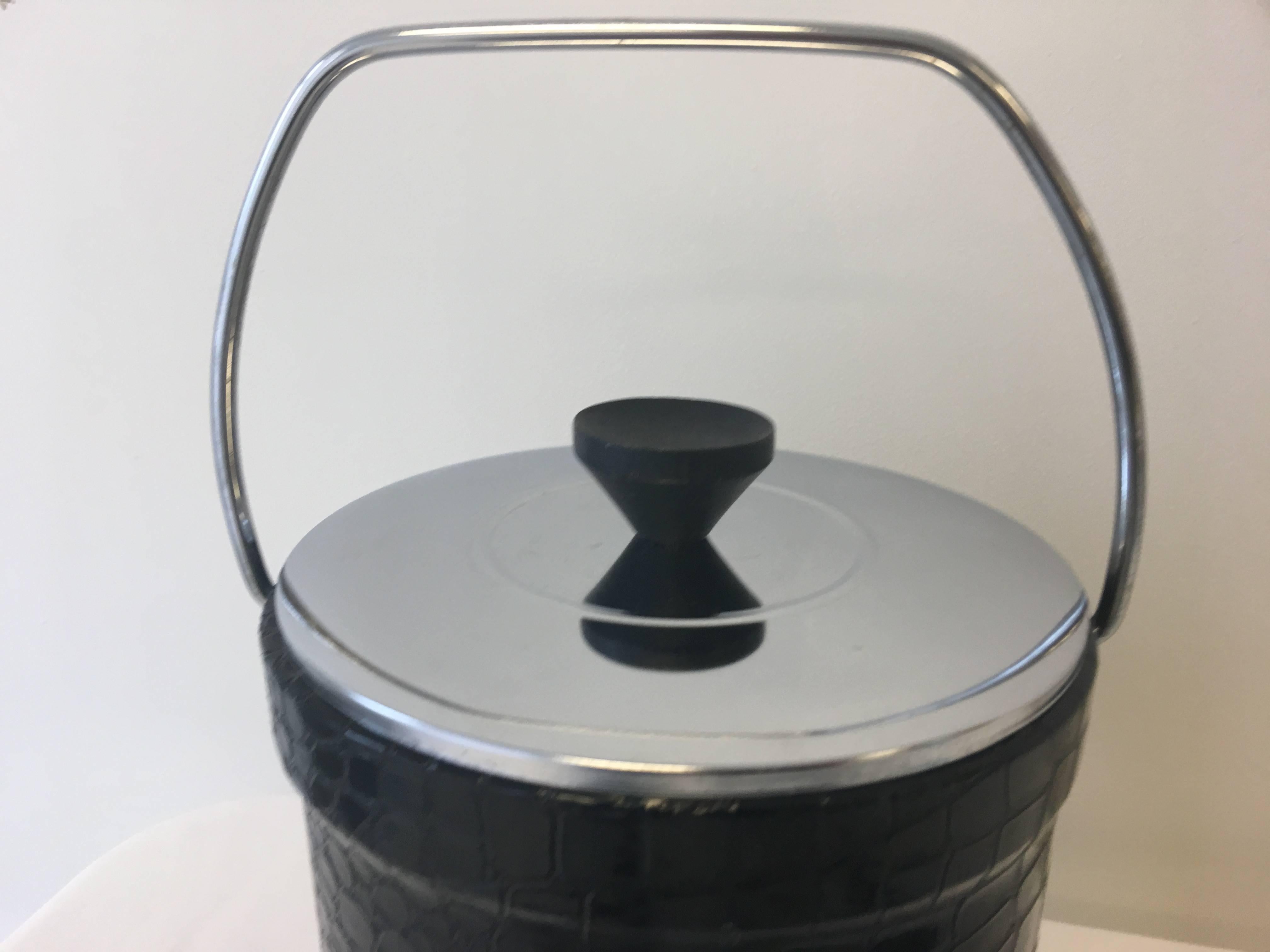 Offered is a fabulous, Mid-Century Modern chrome and faux black alligator bar set. Set includes ice bucket, bottle opener, Shaker/strainer, double jigger and ice tongs. Plastic liner.