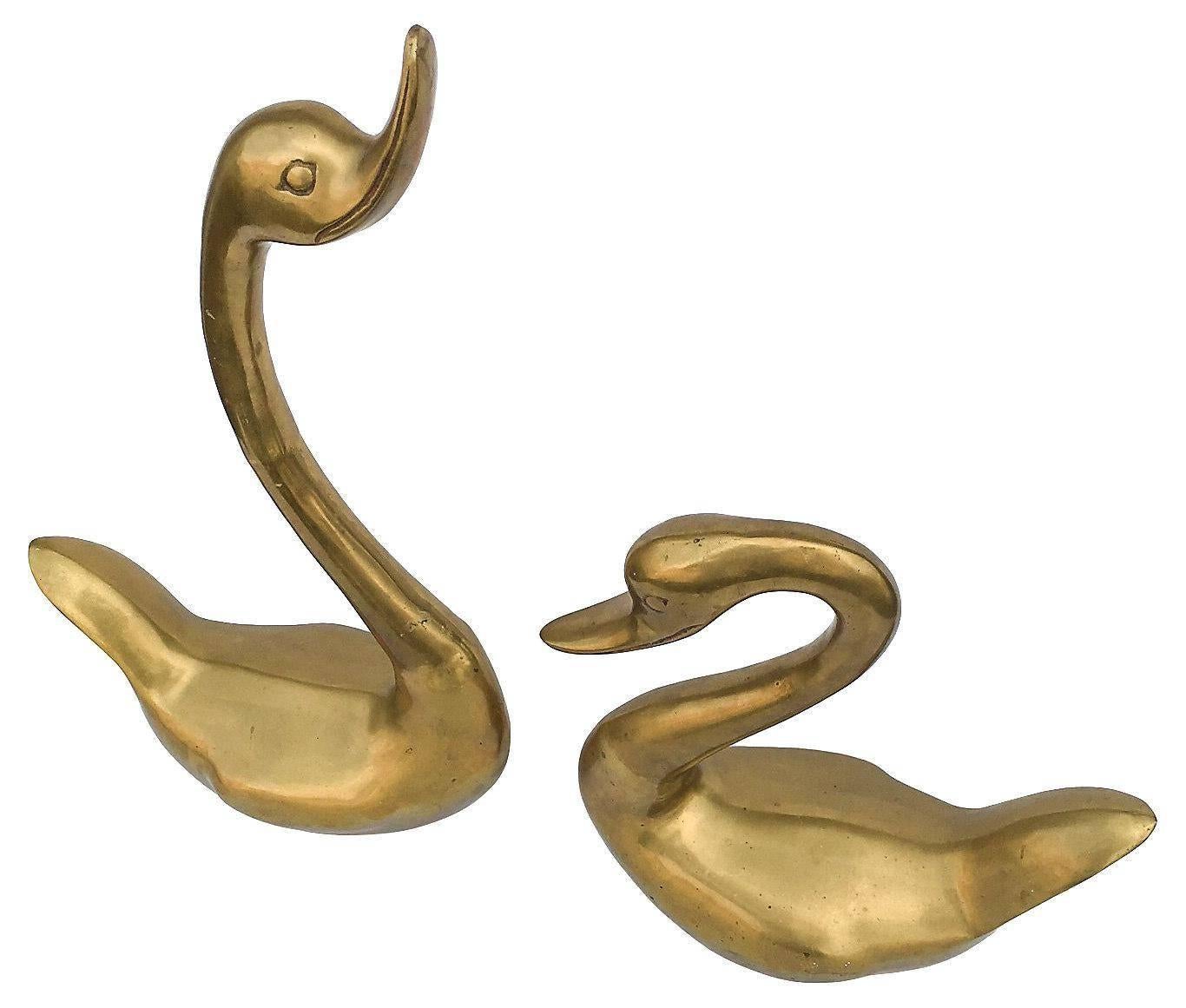 brass swans