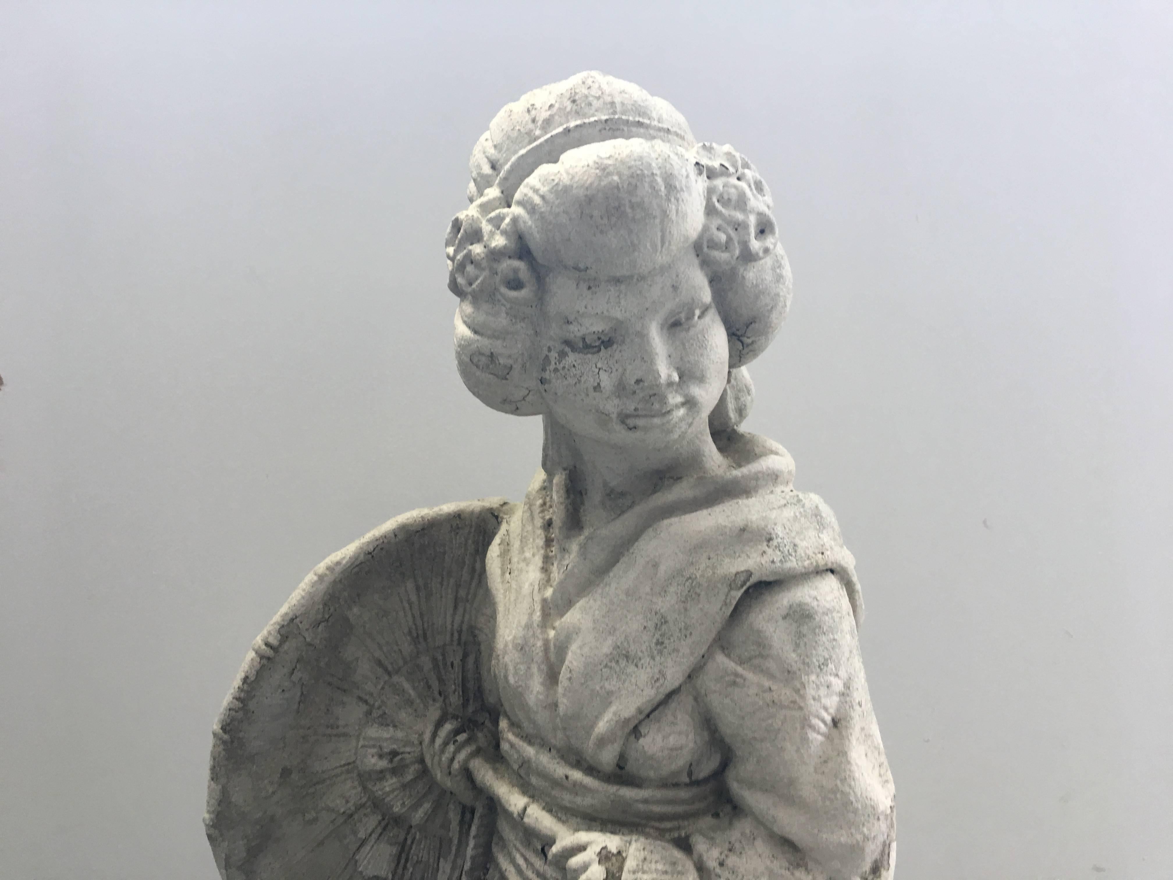 Offered is a gorgeous, 1960s Asian geisha with a parasol concrete garden statue ornament.