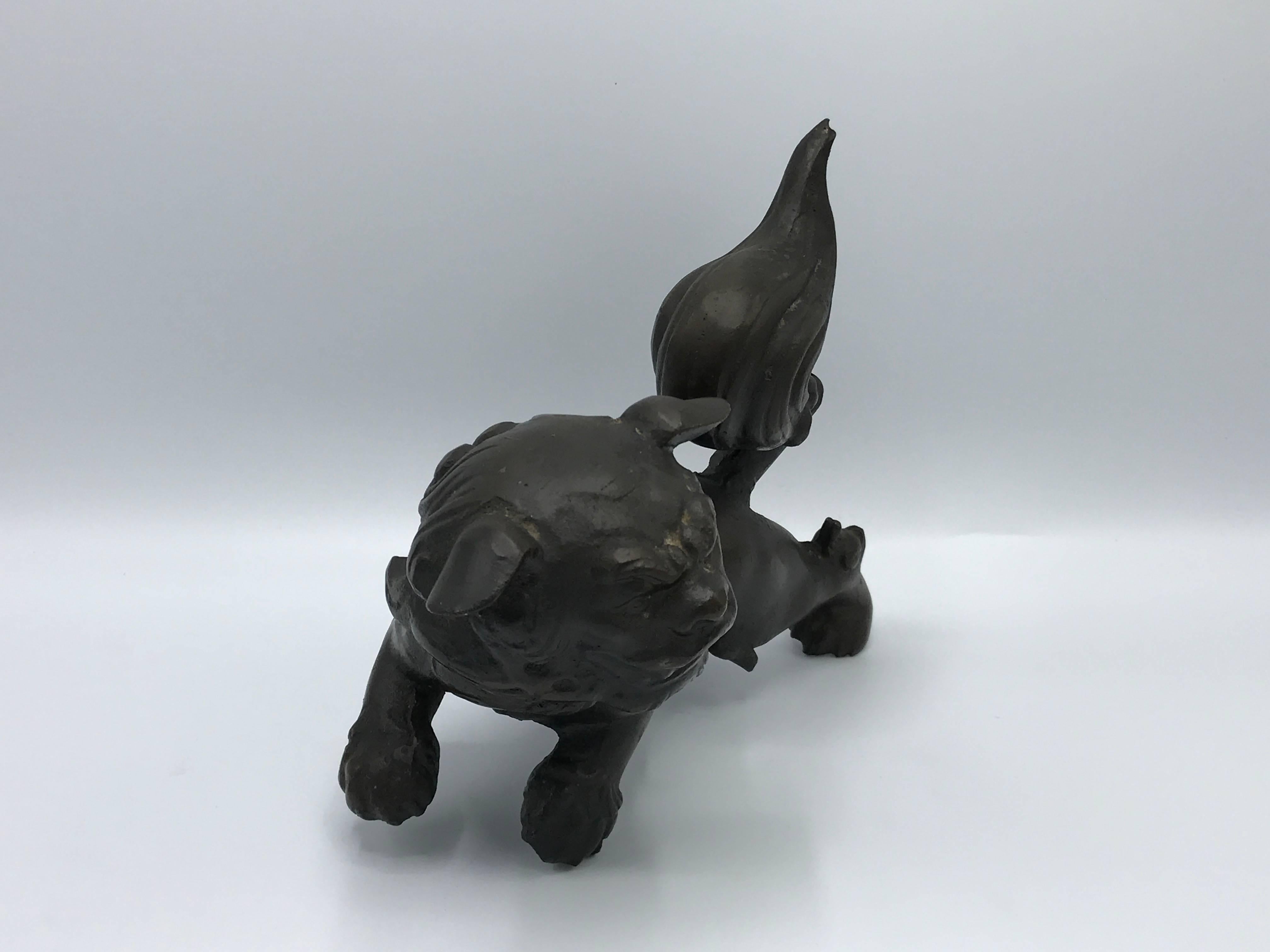 Offered is a stunning, 1920s solid-bronze foo dog statue.