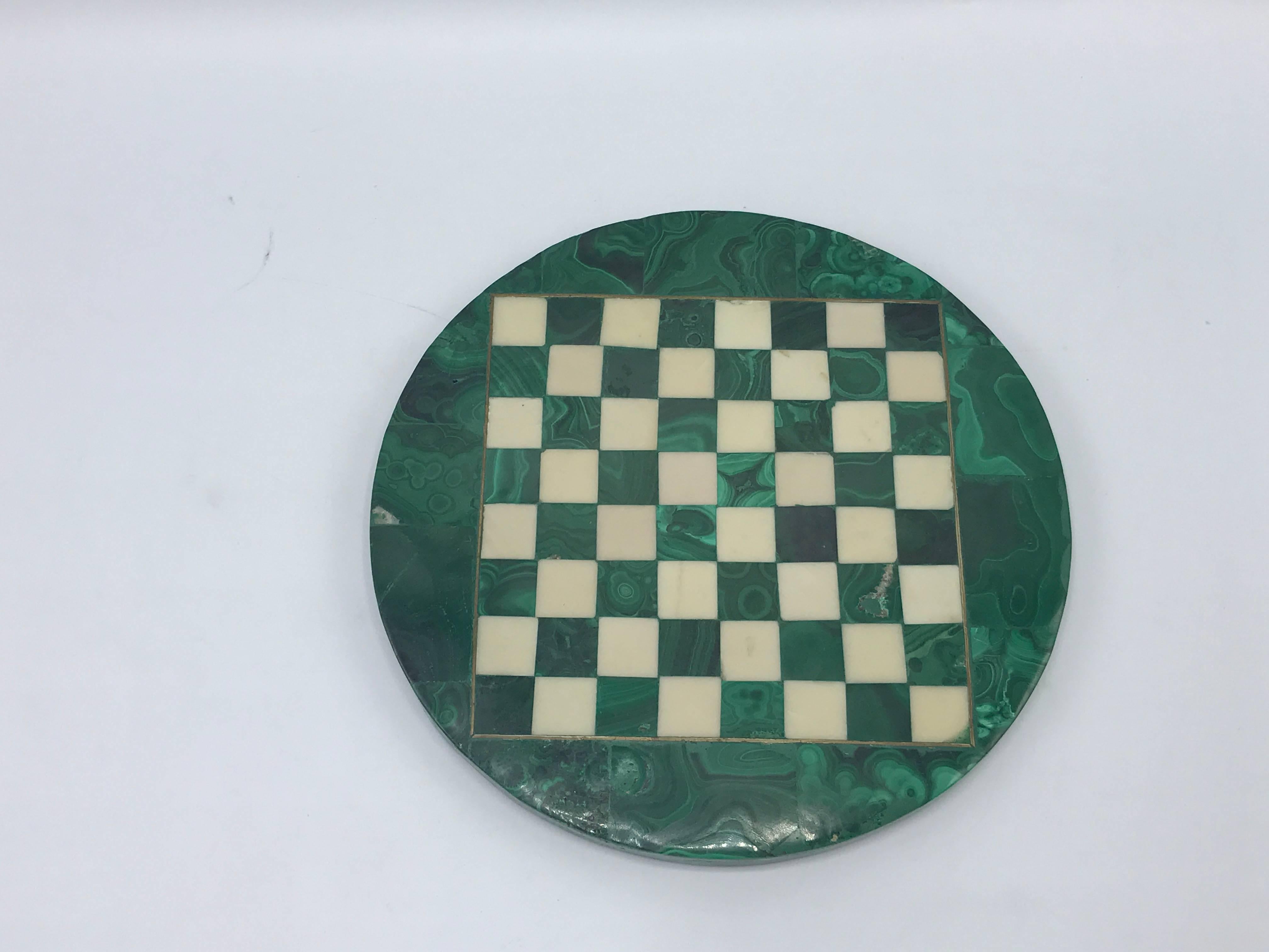 Offered is an immaculate, 1960s, malachite with brass inlay chessboard cheeseboard.