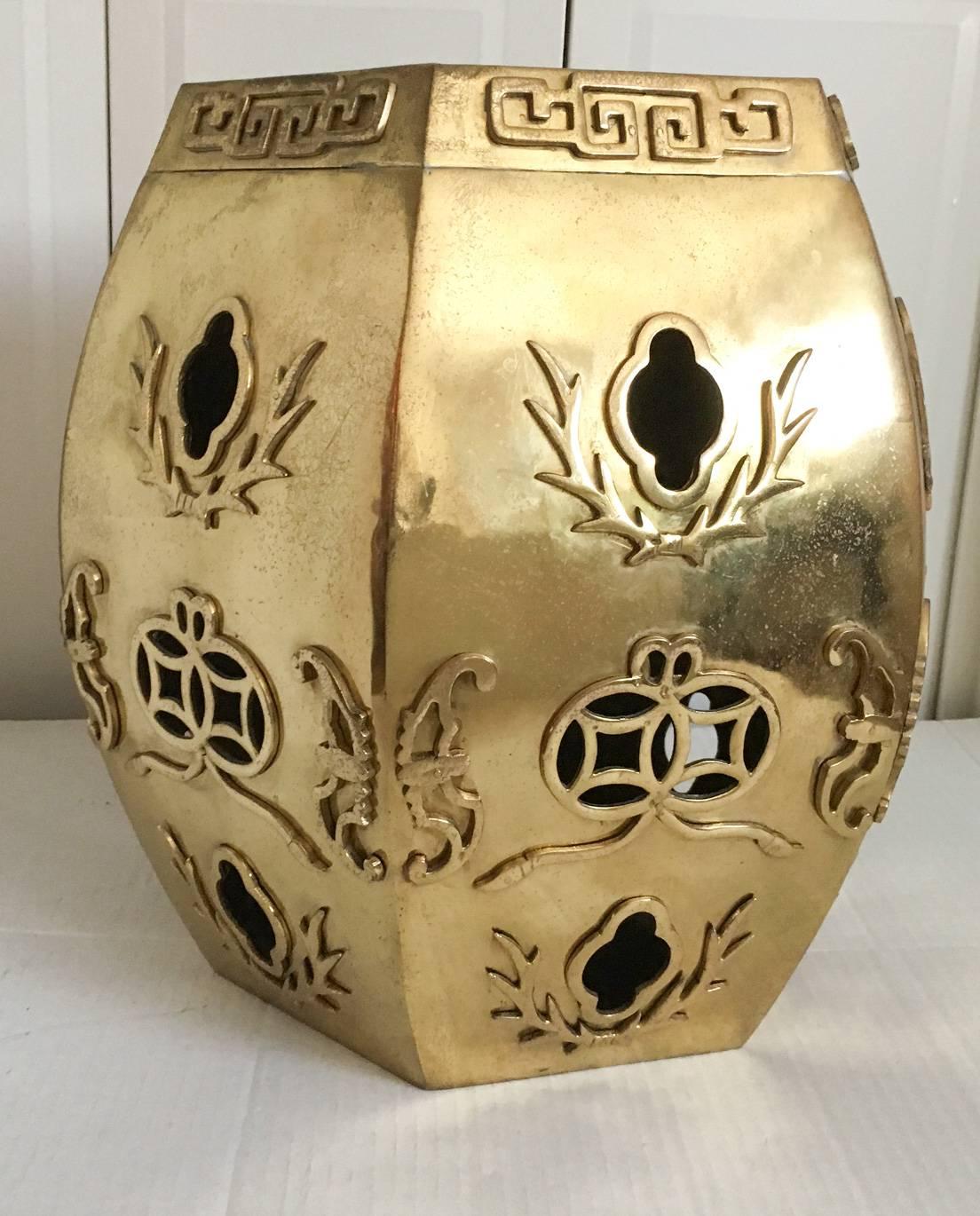 Exquisite and heavy 15-pound solid brass Chinese garden stool with a gorgeous pierced top and side panels. Piece has some all-over natural brass age patina and tiny age spots as shown. Unmarked.