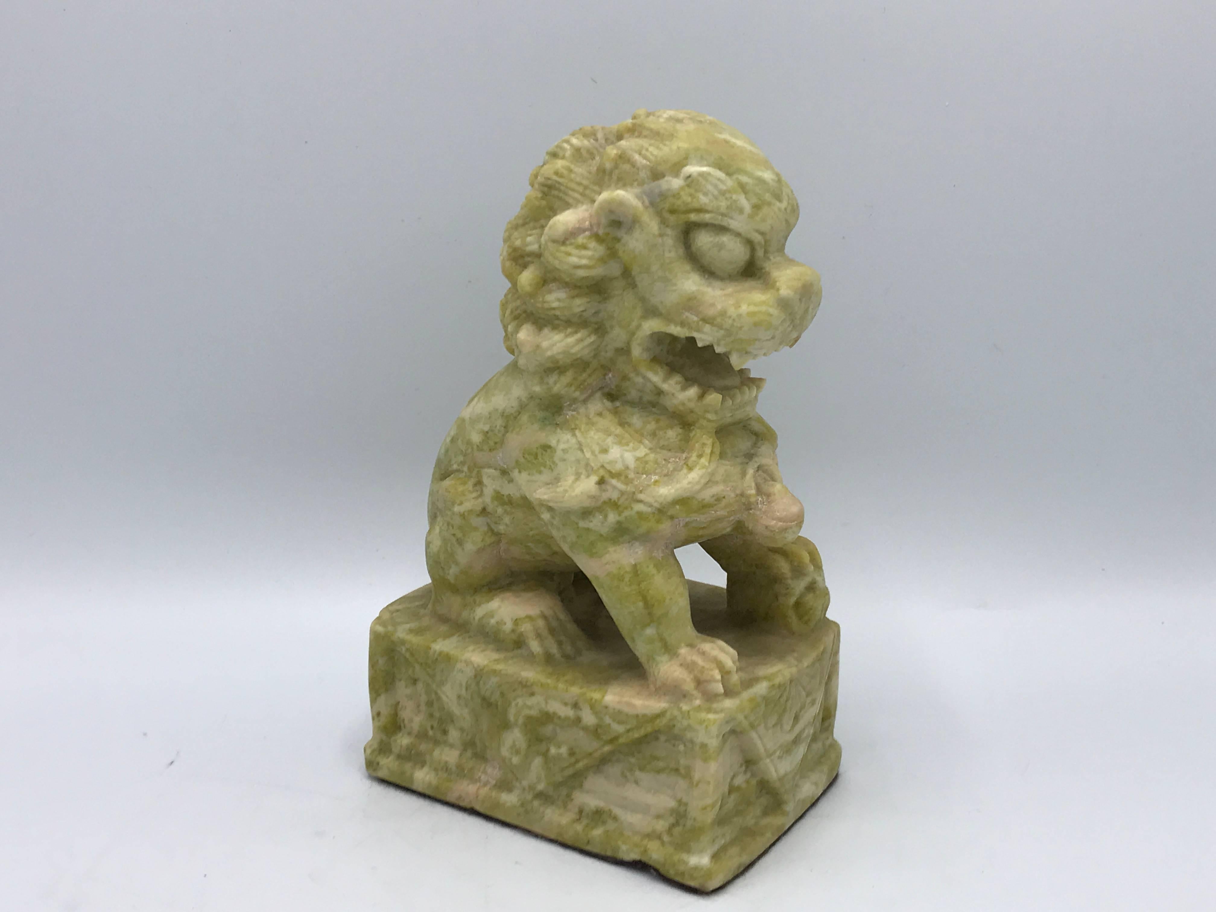 Offered is a stunning, 1960s faux jadeite stone foo dog.