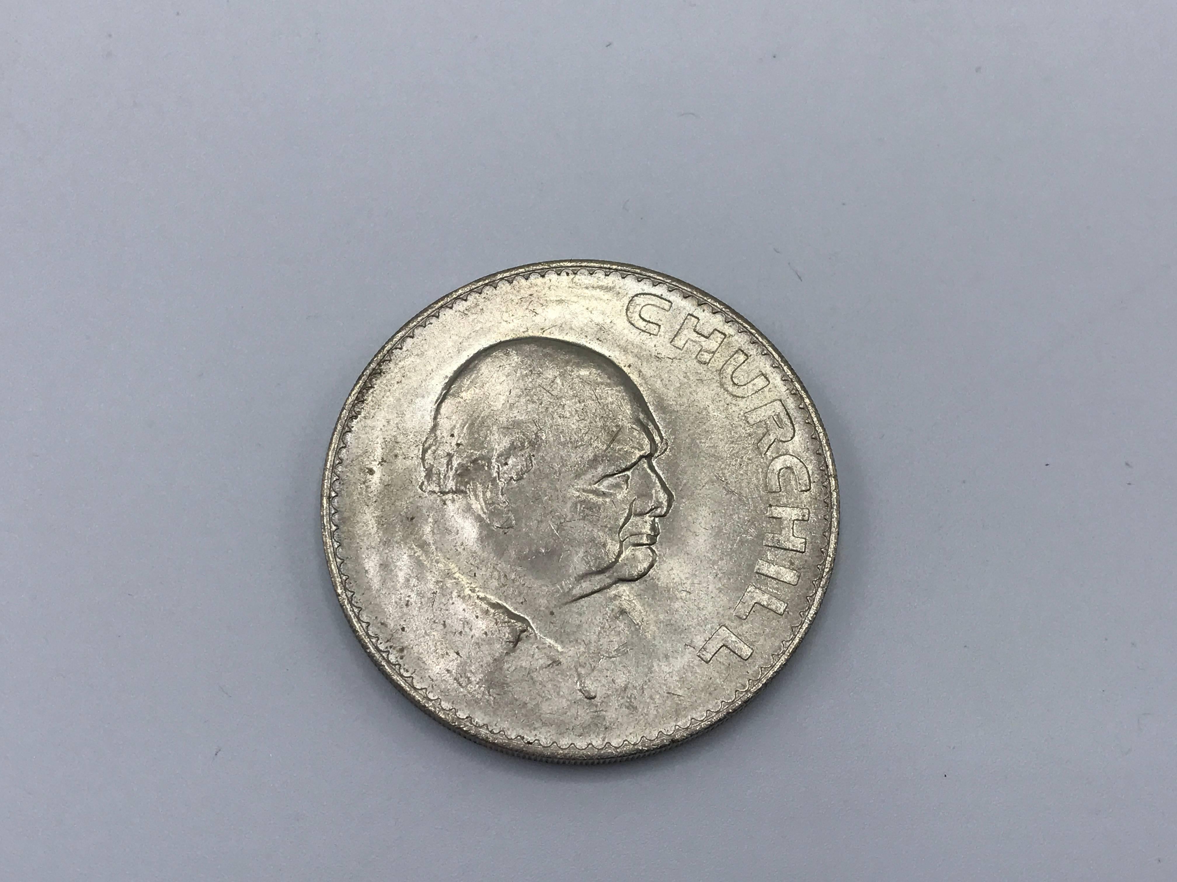 Offered is a rare and highly collectable, Elizabeth II 1965 Churchill commemorative crown coin. The 1965 crown coin was minted to commemorate Sir Winston Churchill, who died 24th January 1965. The crown was struck in cupro-nickel and depicts