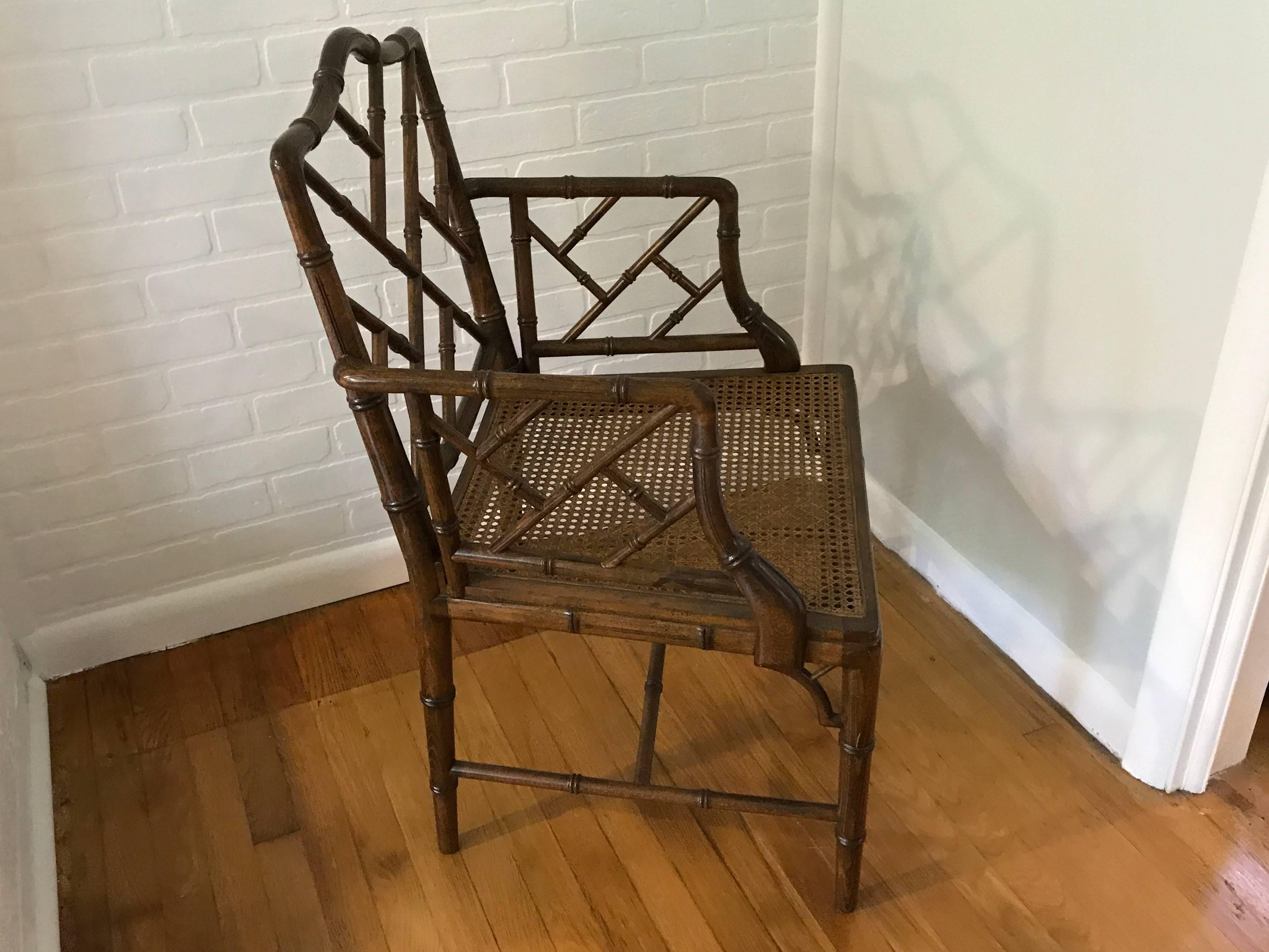 Offered is a stunning, 1960s faux bamboo Chinese Chippendale side chair. Includes cushion, though needs to be reupholstered (see last two photos). Excellent condition, caning does not sag or have any breaks.