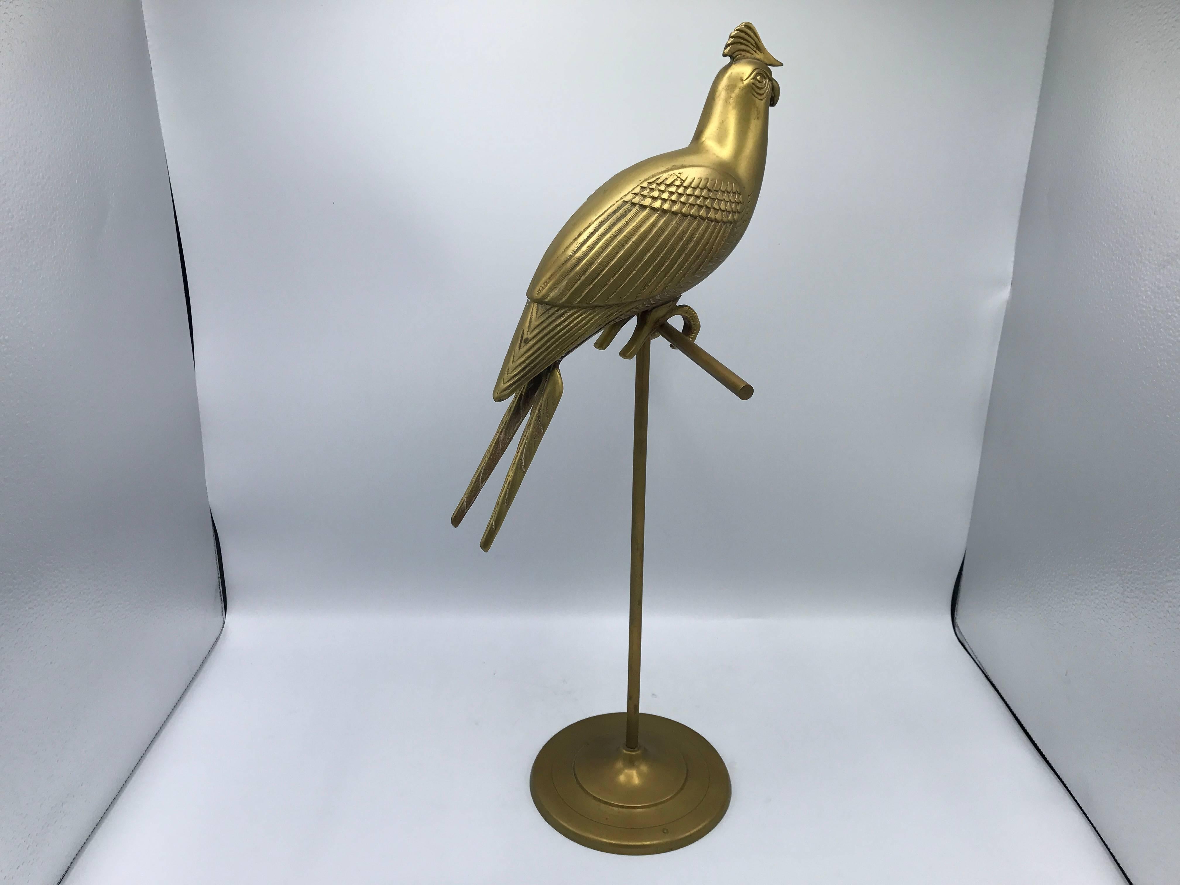 Offered is a beautiful, 1960s Sergio Bustamante style brass cockatiel bird sculpture on a perch.