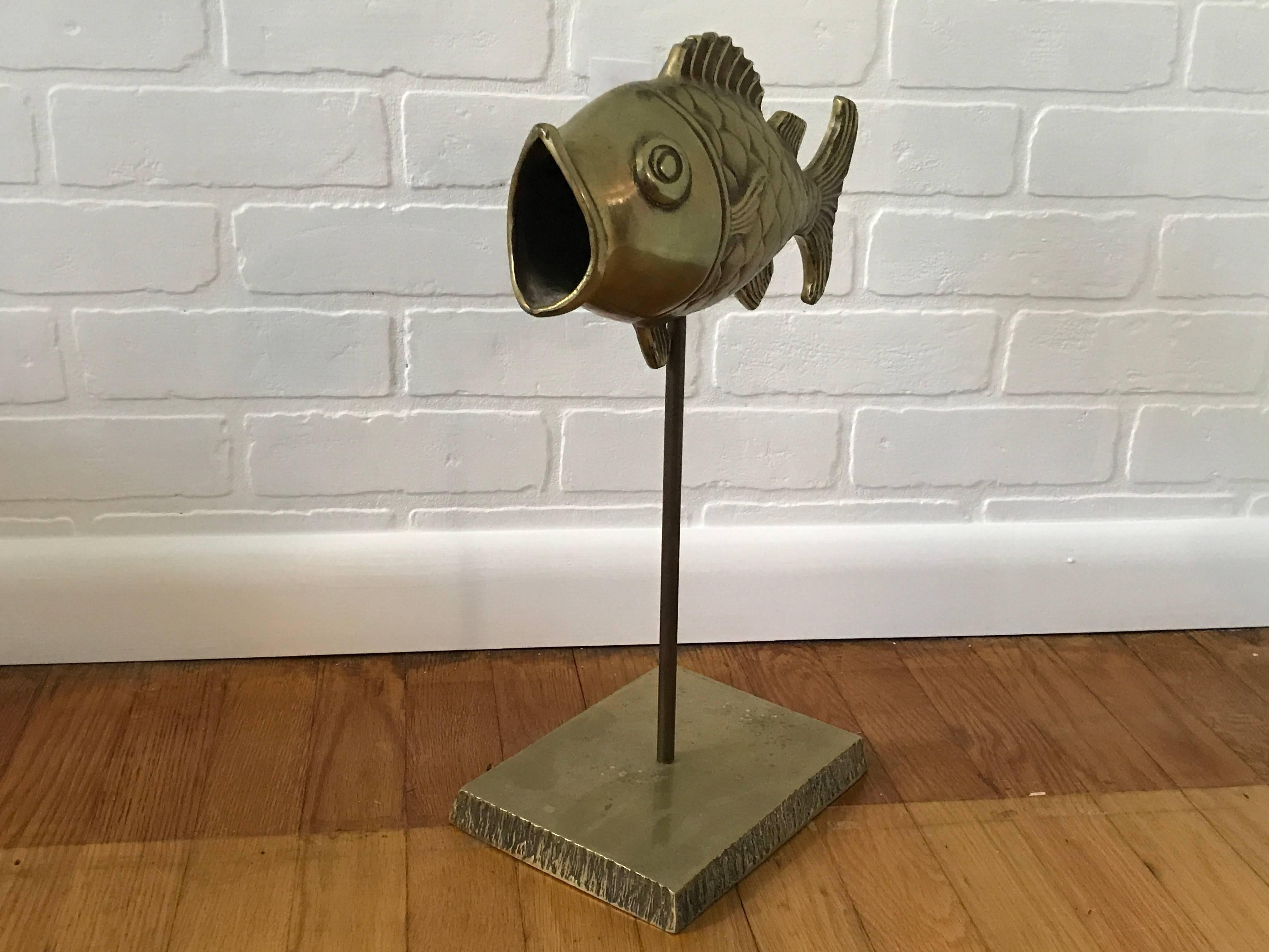 Offered is a gorgeous, 1970s brass fish on a mounted to a brass stand, in the style of Sarreid Ltd. Heavy.