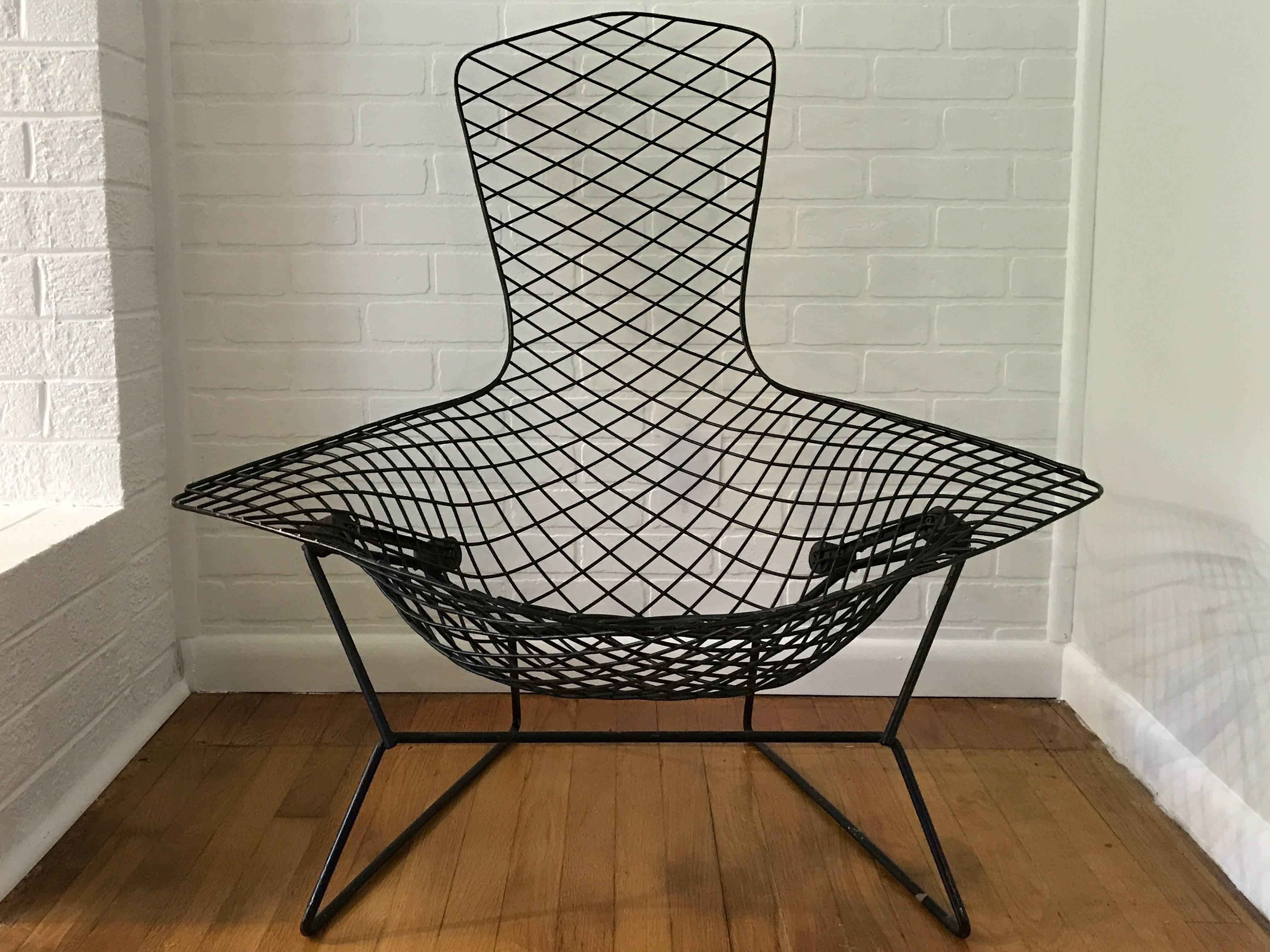 Offered is a gorgeous, 1970s Harry Bertoia bird chair for Knoll Inc. Frame is in great condition. Comes with original blue cover, has minor marks/stains on bottom half.