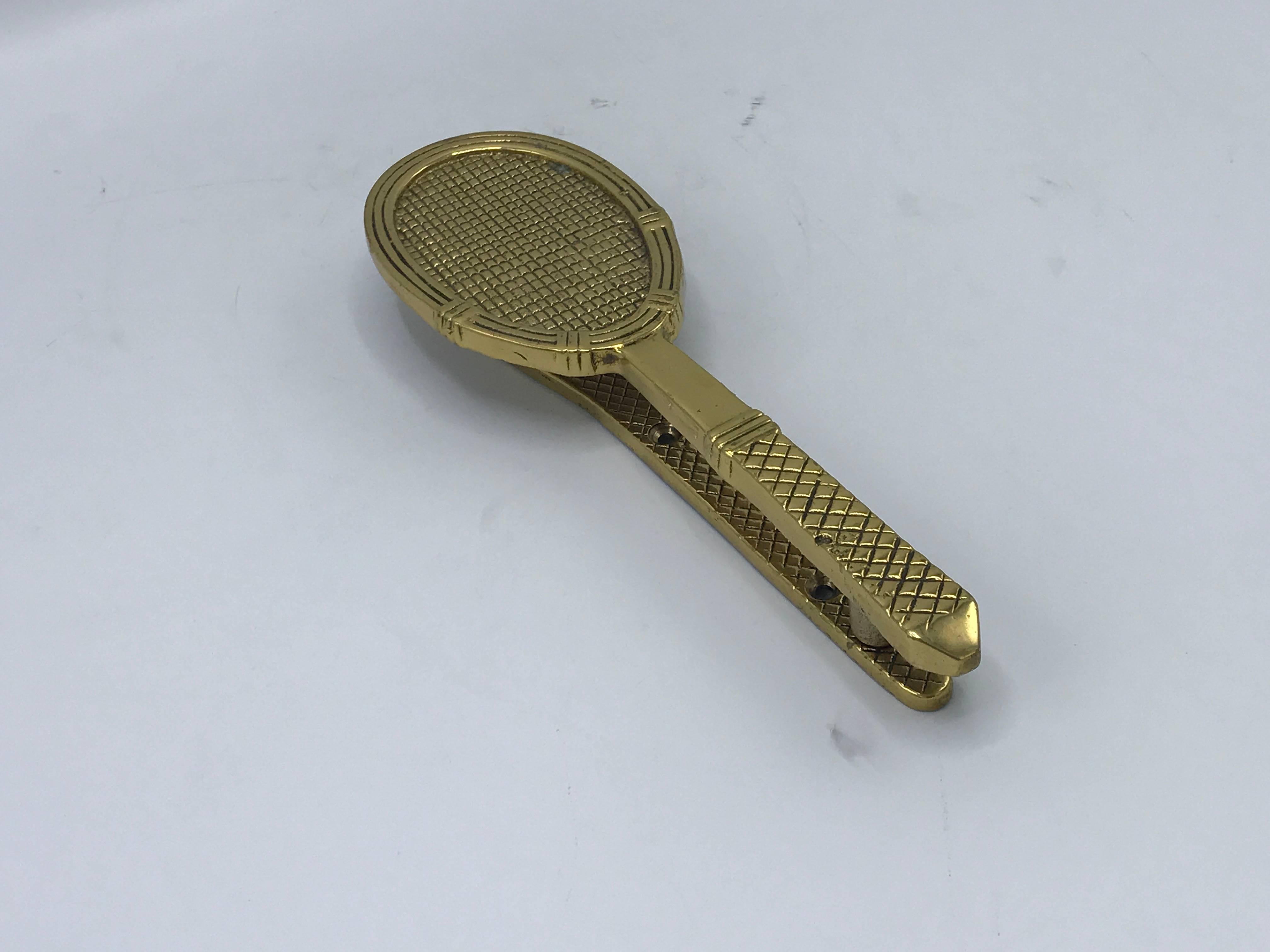 Offered is a fabulous, 1960s solid-brass tennis racket door knocker. Heavy.