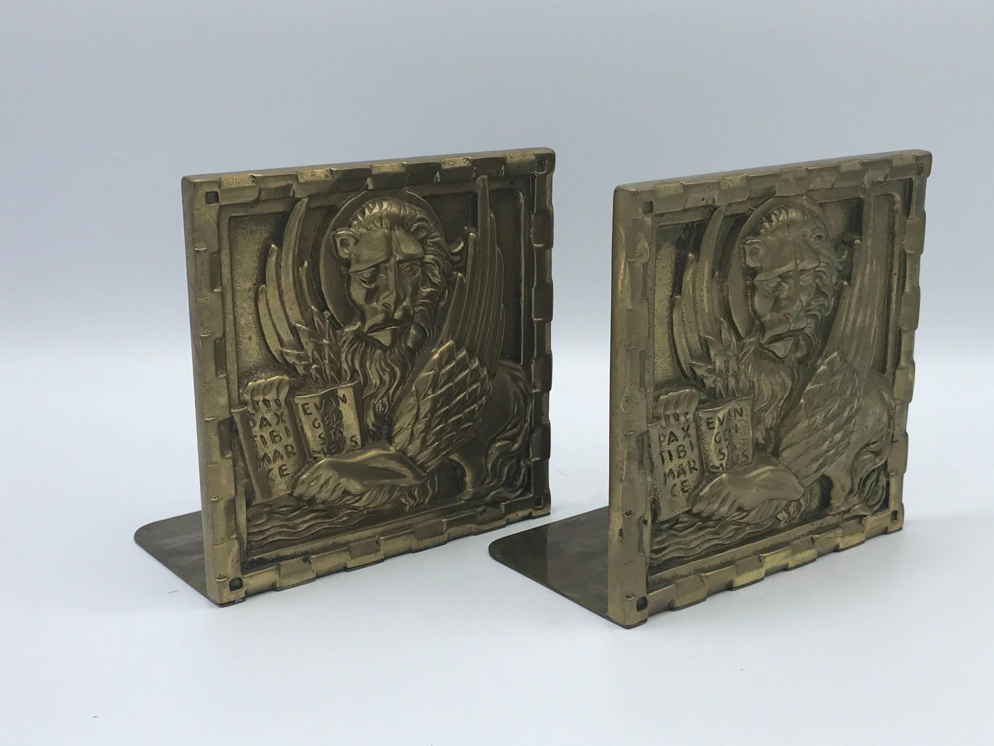 Offered is a fabulous pair of 1960s brass 'Seal of Venice' lion bookends. Marked: Bronzi Artistici, Venezia.