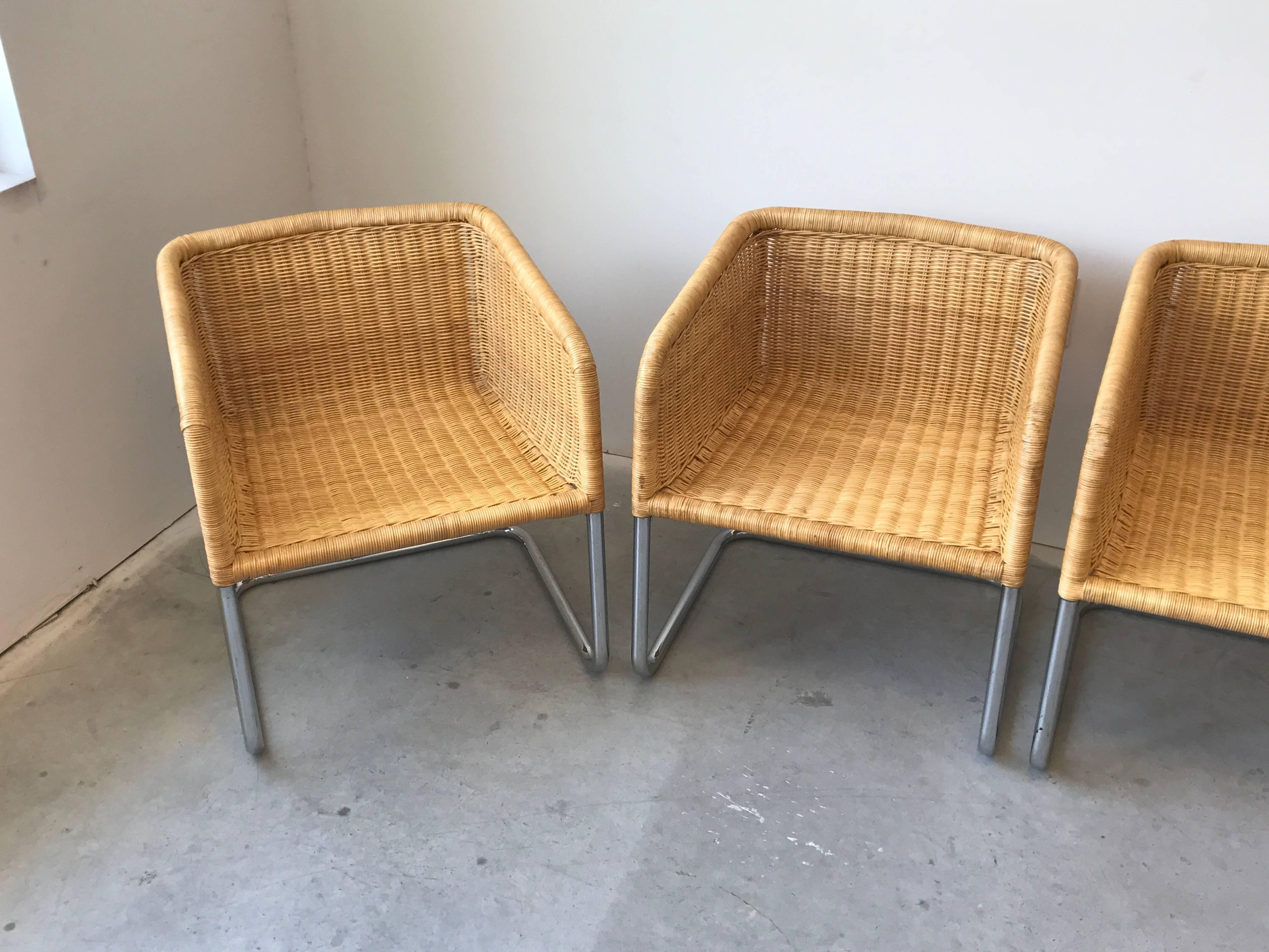 Offered is a fabulous, set of four, 1970s Fabricius and Kastholm style wicker basket cantilever chairs with chrome bases. Extremely sturdy and comfortable. Can easily dress up with a seat cushion.