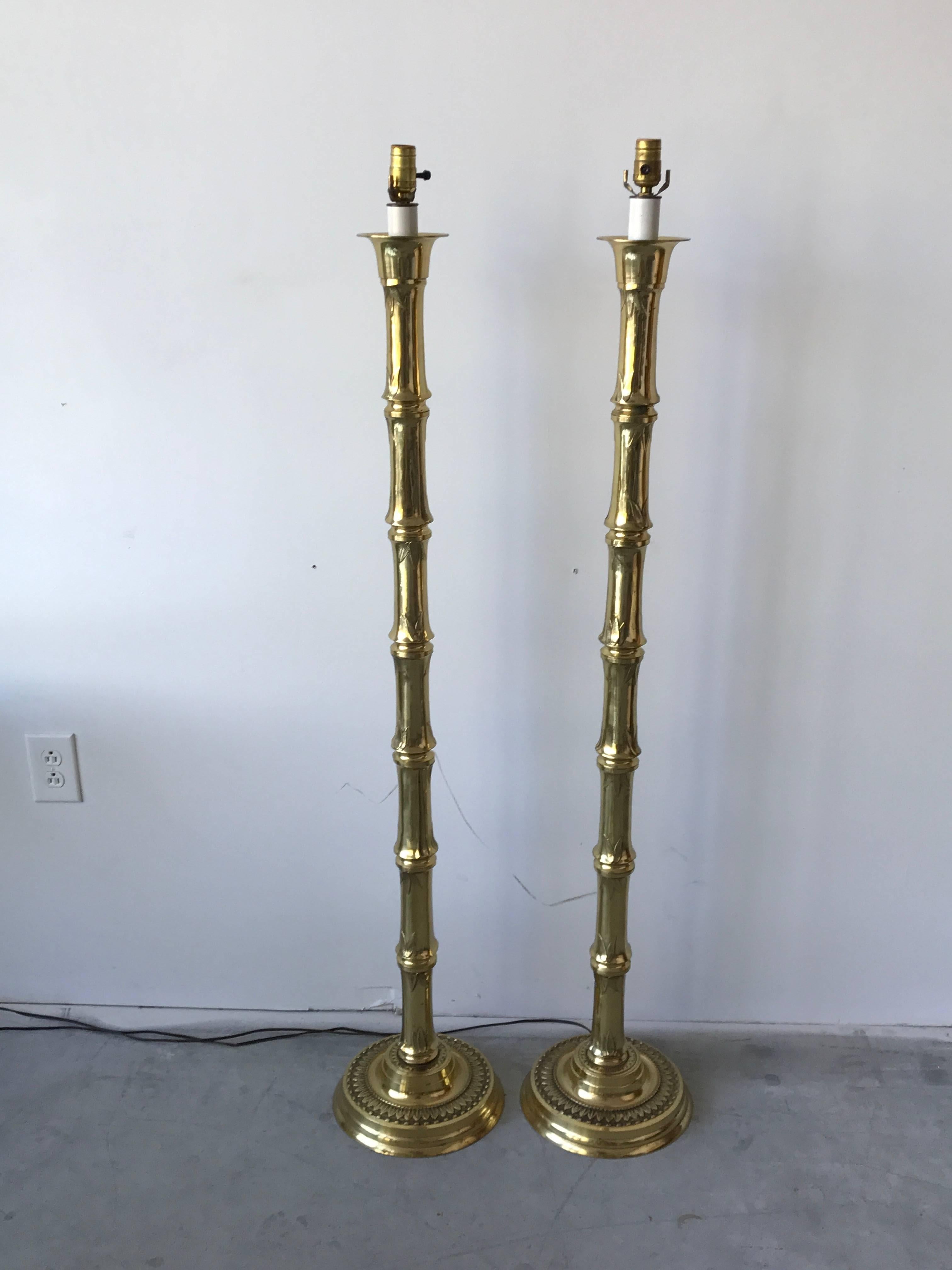 Offered is a fabulous, pair of 1970s brass faux bamboo floor lamps. Heavy.
