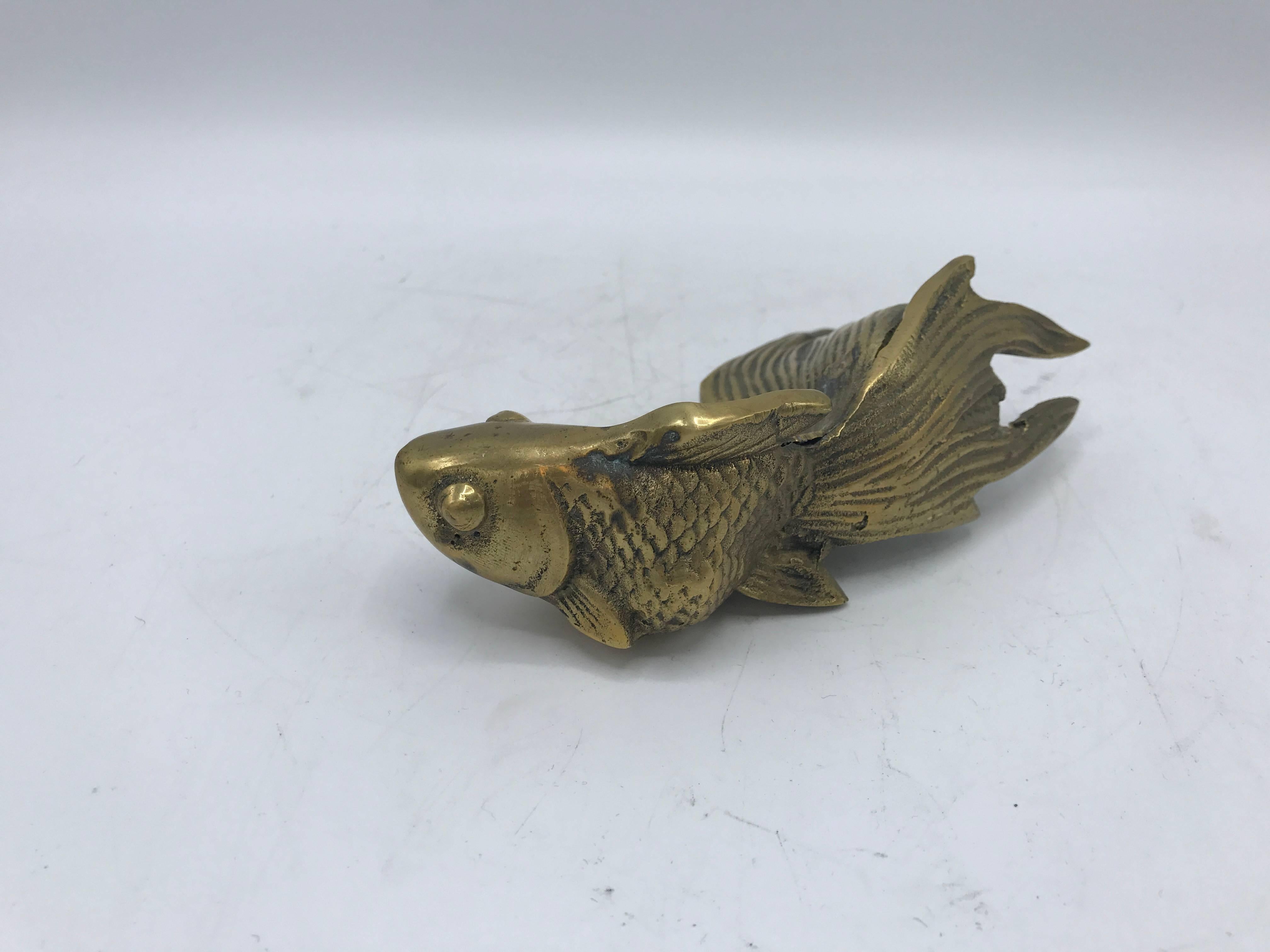 Offered is a fabulous, 1960s brass koi fish sculpture. Perfect for any brass collector!