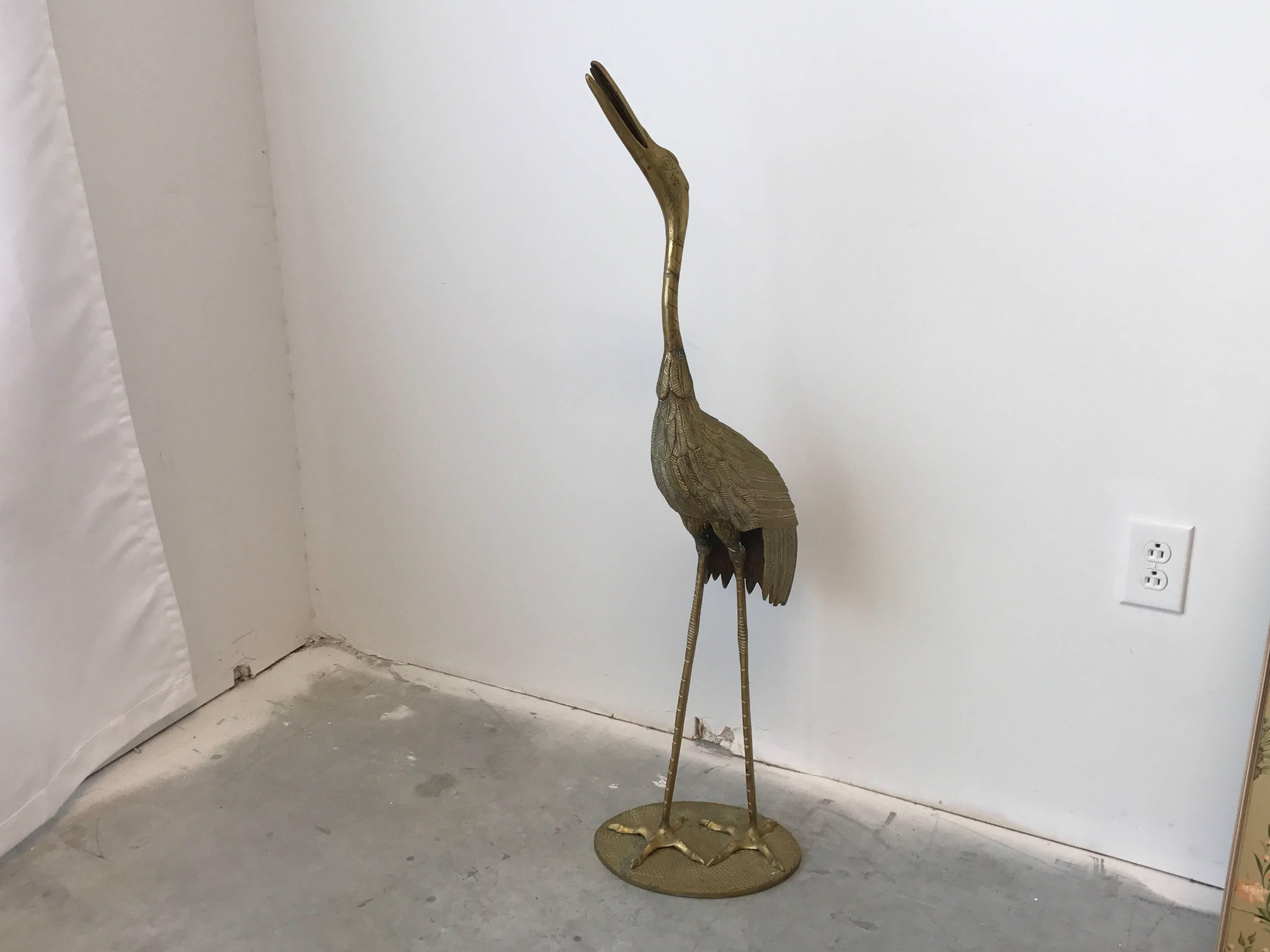 Offered is a fabulous and rare, life-sized 1960s Italian brass heron sculpture. Heavy. Stands nearly 4ft tall!