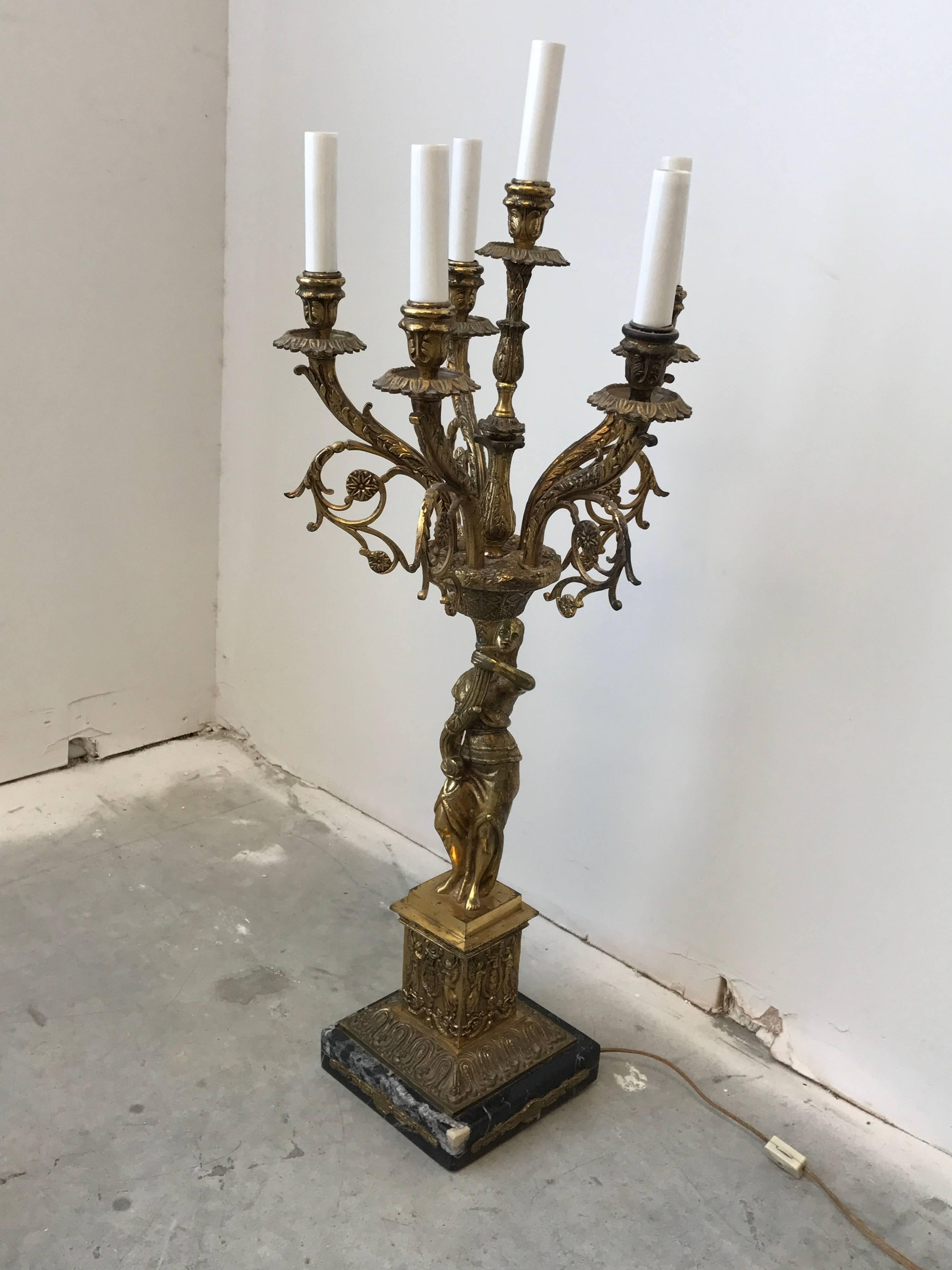 Offered is an exquisite, late 19th century French Art Nouveau, bronze and marble sculptural candelabra lamp. The piece has six arms, all with heavy detailing. Extremely heavy.