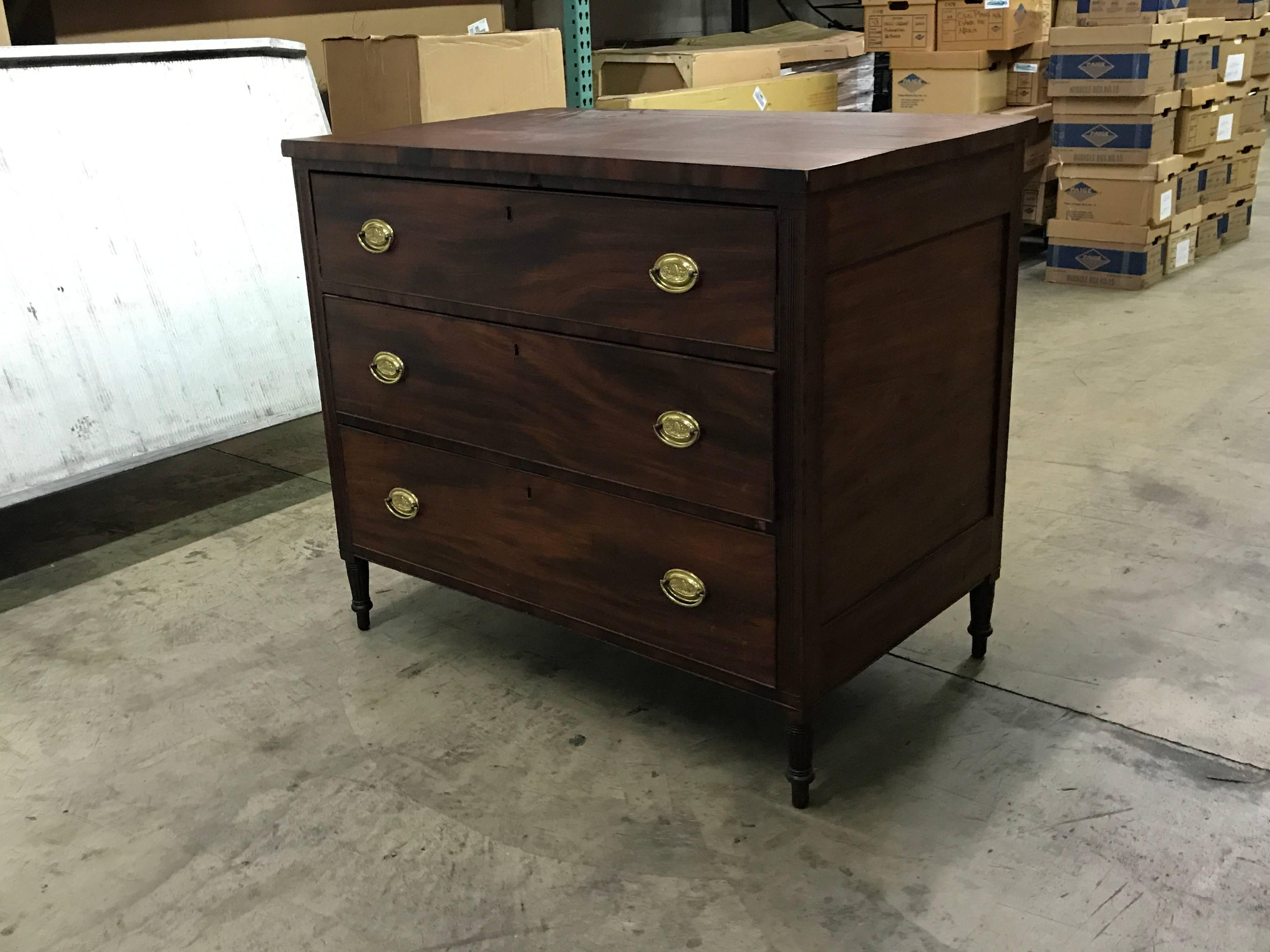 Offered is an exquisite, late 18th century English-Georgian mahogany chest with three graduated drawers, finished with original brass plates and pulls. Dovetailed drawers. Does not include key. Extremely sturdy. 

Top drawer, 8". Middle