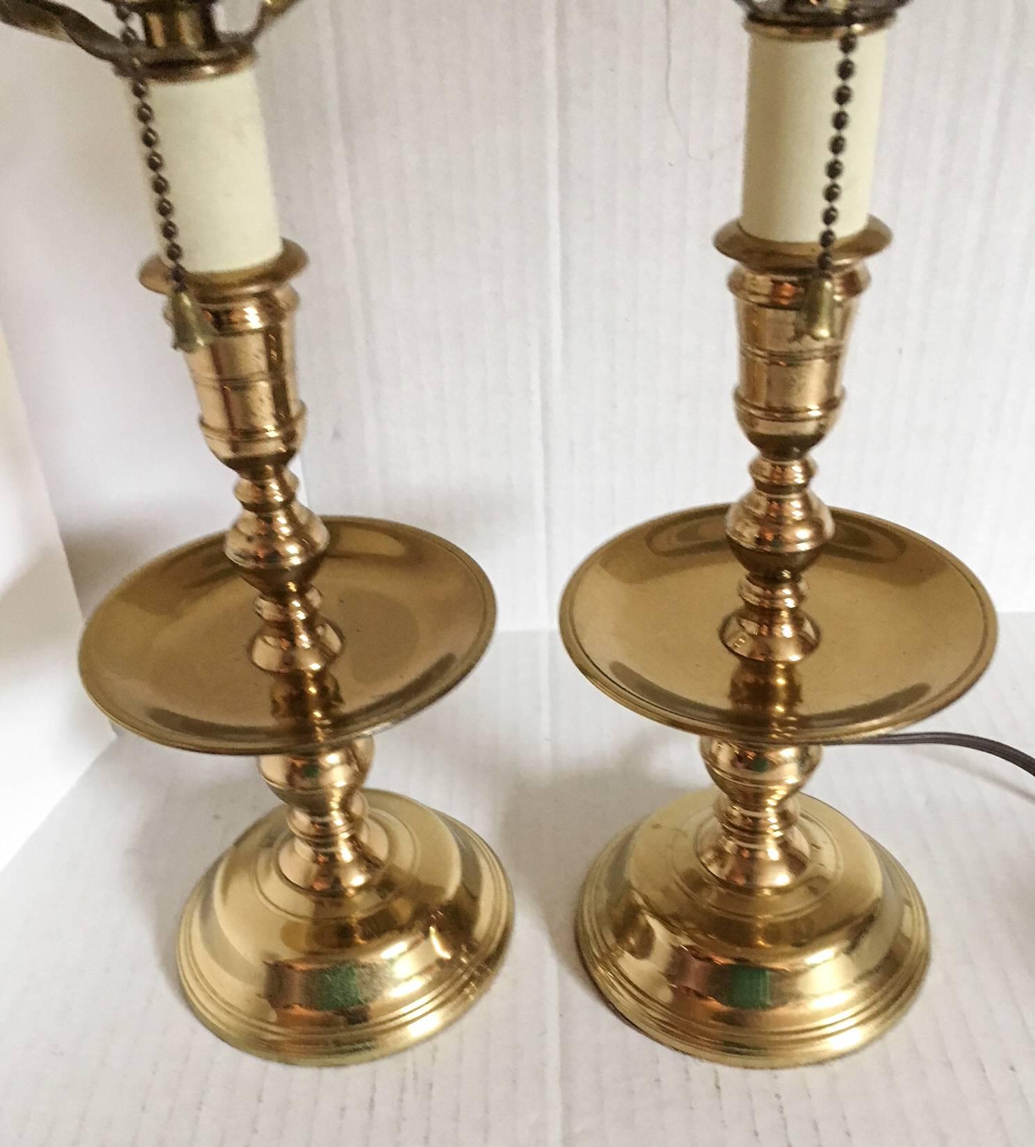 Fantastic pair of 1950s Virginia Metalcrafters table lamps, made in Waynesboro, Virginia, circa 1950s. Each has a pull chain mechanism with updated wiring in working condition. Lamps have a lovely warm sheen and heavy quality to them, a