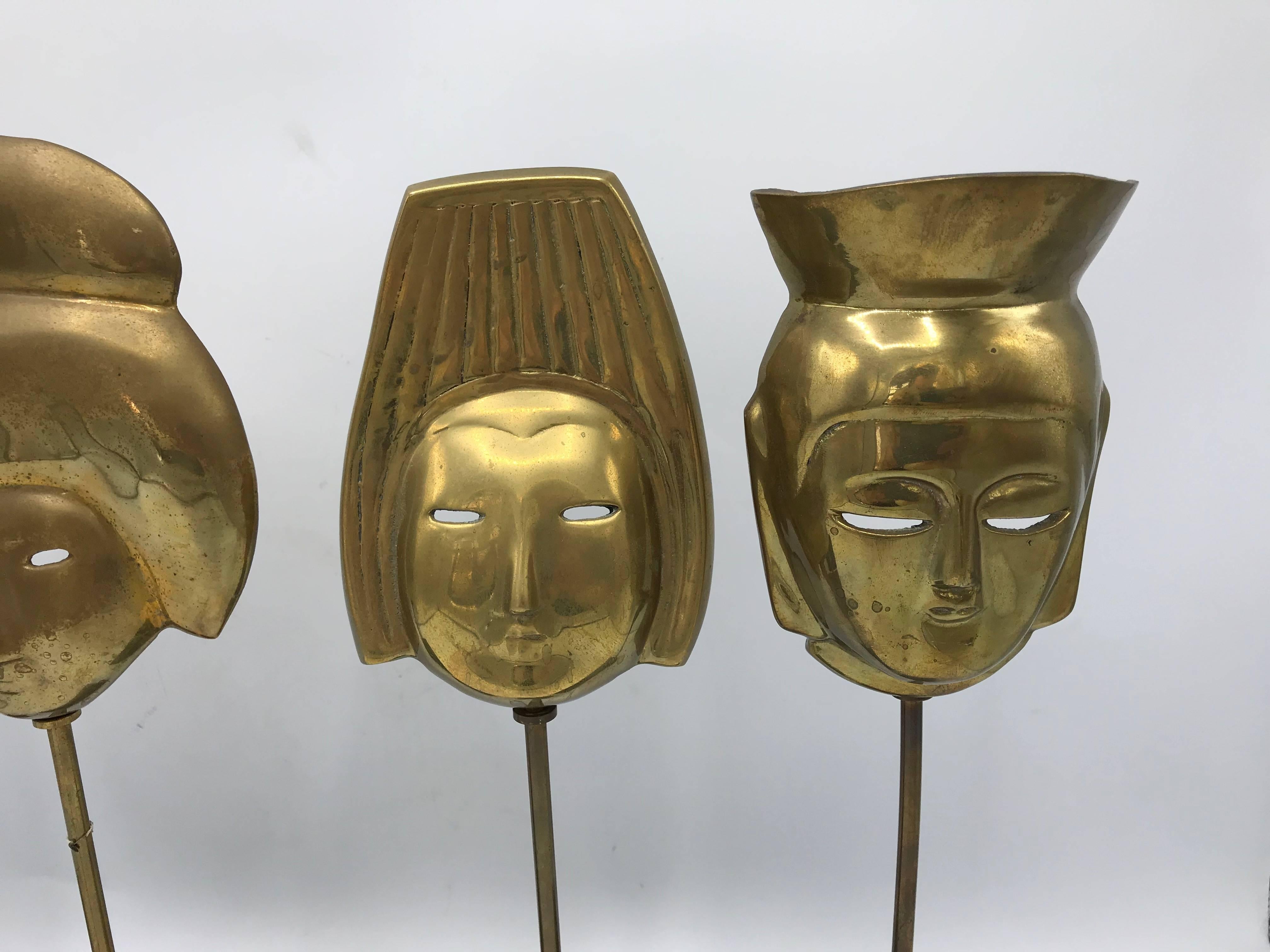 1960s, Italian Modern Brass Asian Mask Sculptures on Marble Base, Set of Four In Excellent Condition In Richmond, VA