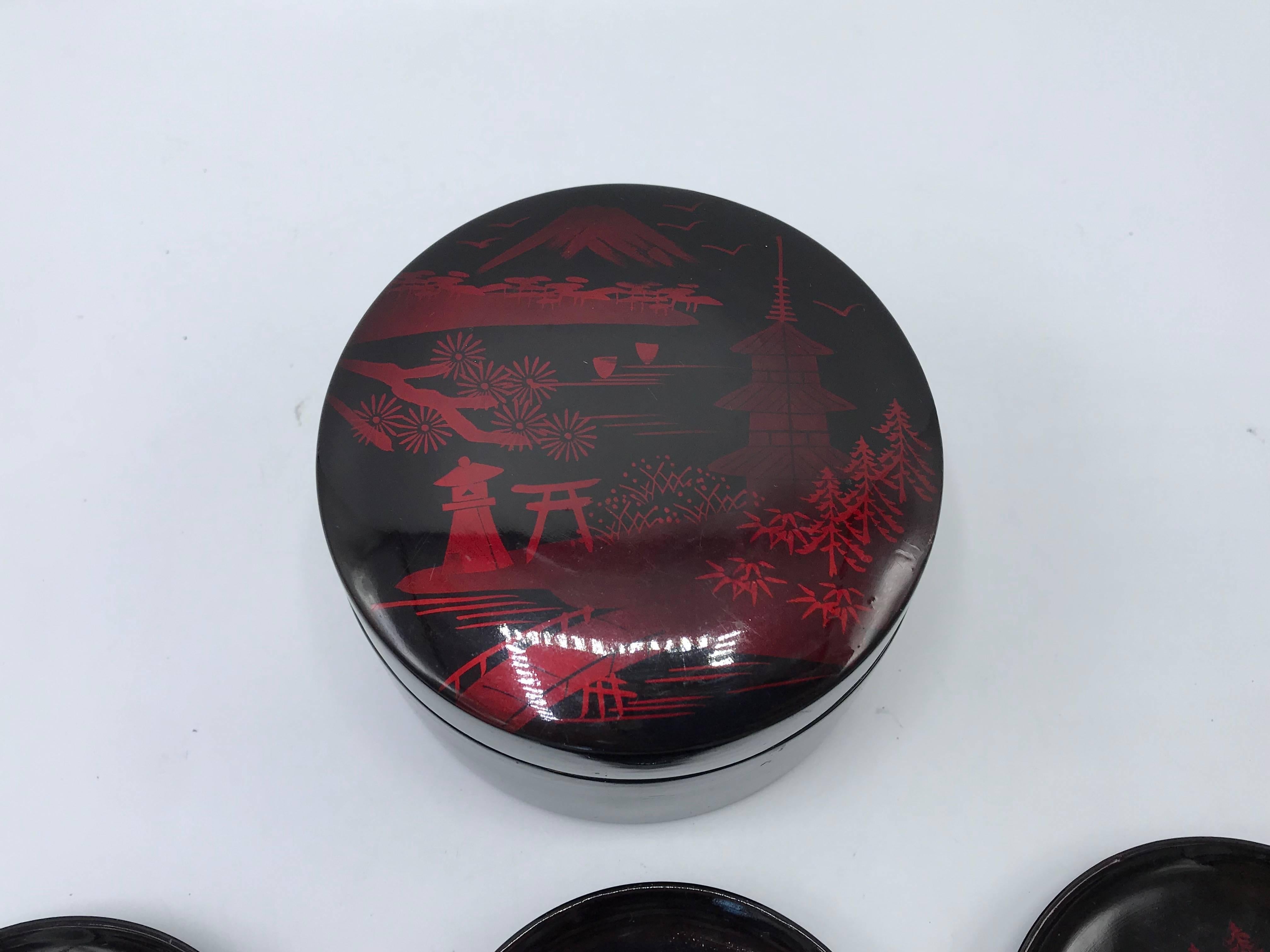 Japanese 1960s Lacquered Red and Black Pagoda Motif Coasters with Box, Set of Seven