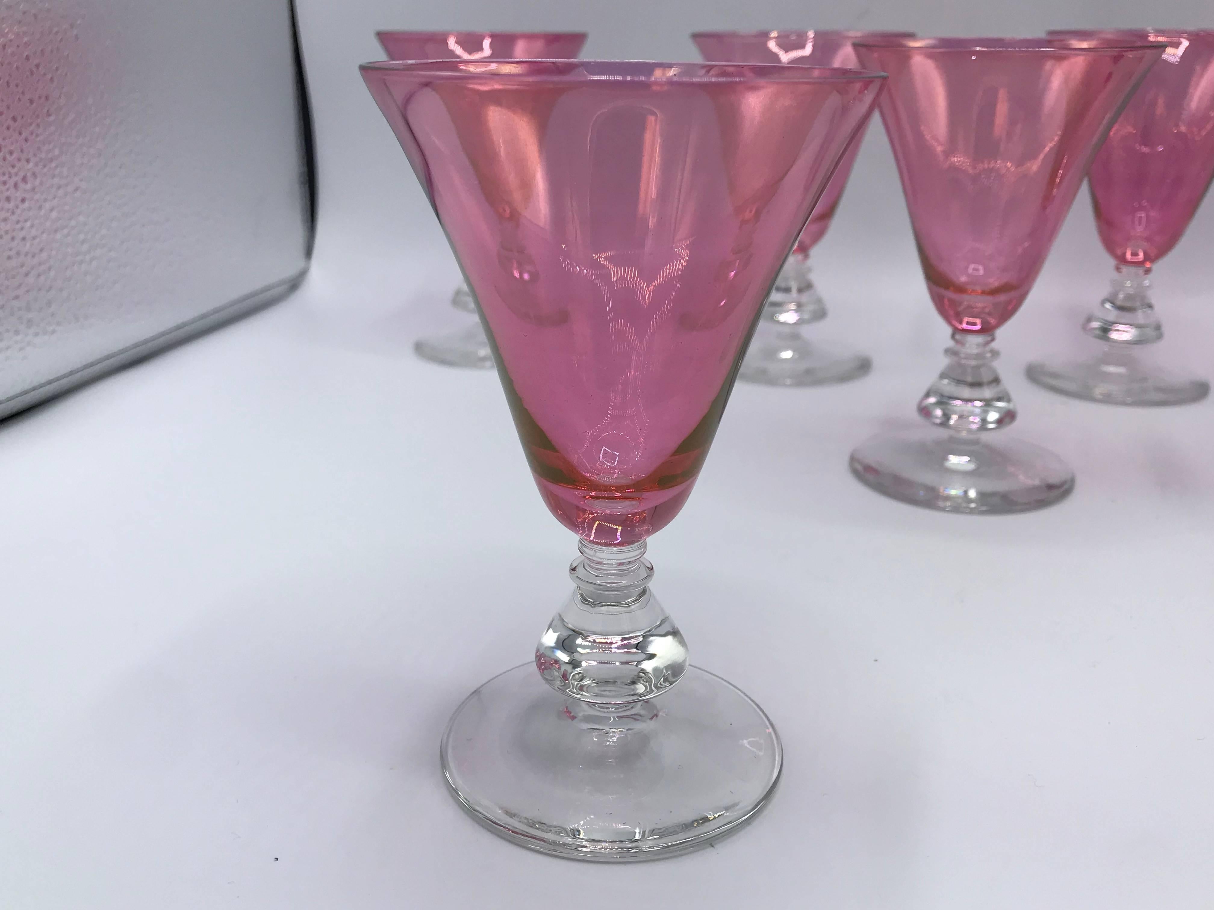 Offered is an exquisite, set of eight, 1960s Italian Murano glass stemmed cocktail glasses. Stunning ballet-slipper flamingo pink on clear-glass stem.