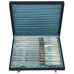 19th Century Tiffany 
Co. Sterling Silver and Mother-of-Pearl Knives, Set of 12