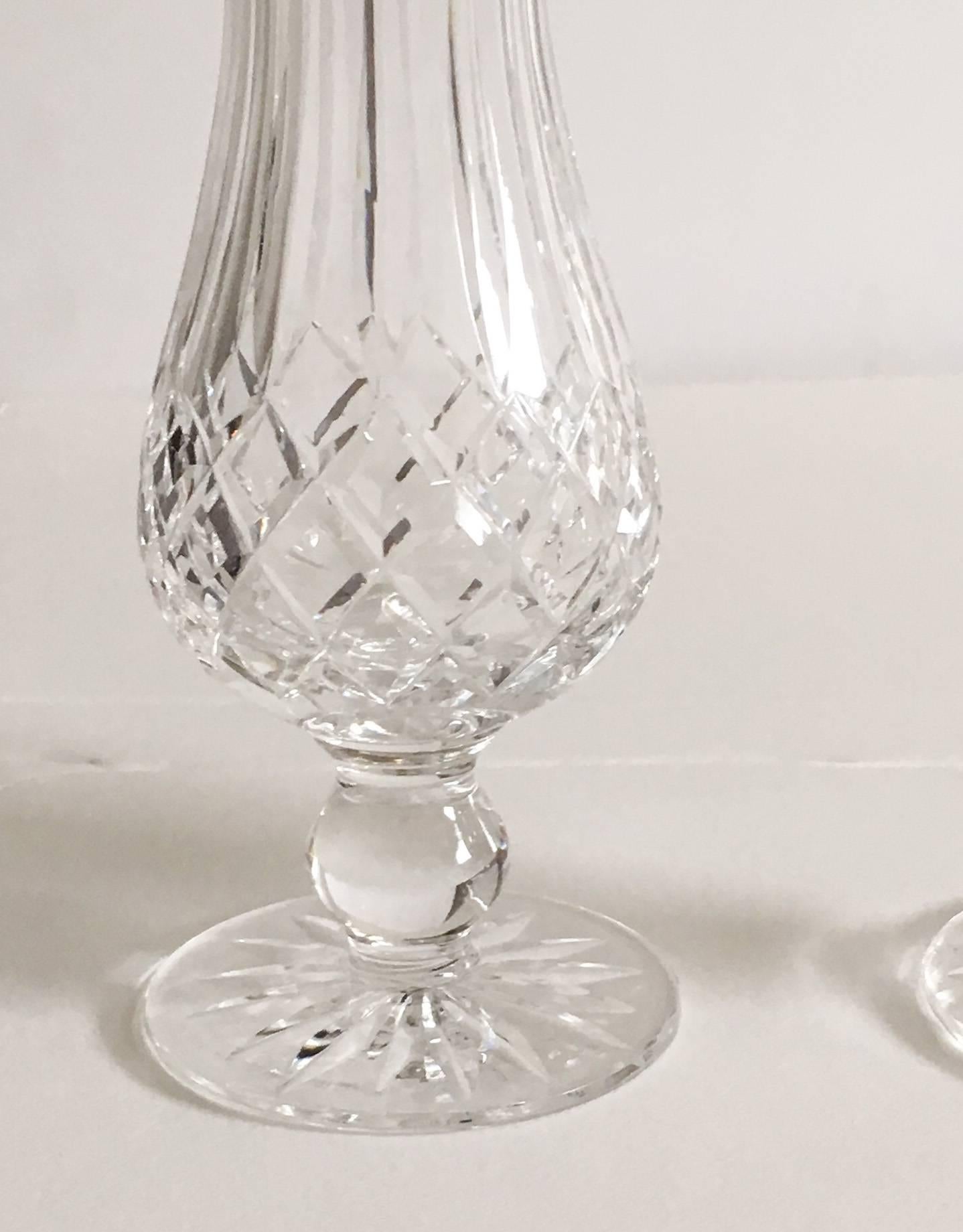 Absolutely gorgeous pair of Waterford crystal salt and pepper shakers with EPNS silverplate tops in the coveted Lismore pattern. No chips or cracks; some age expected tarnish to both shaker tops. Each, 2.5