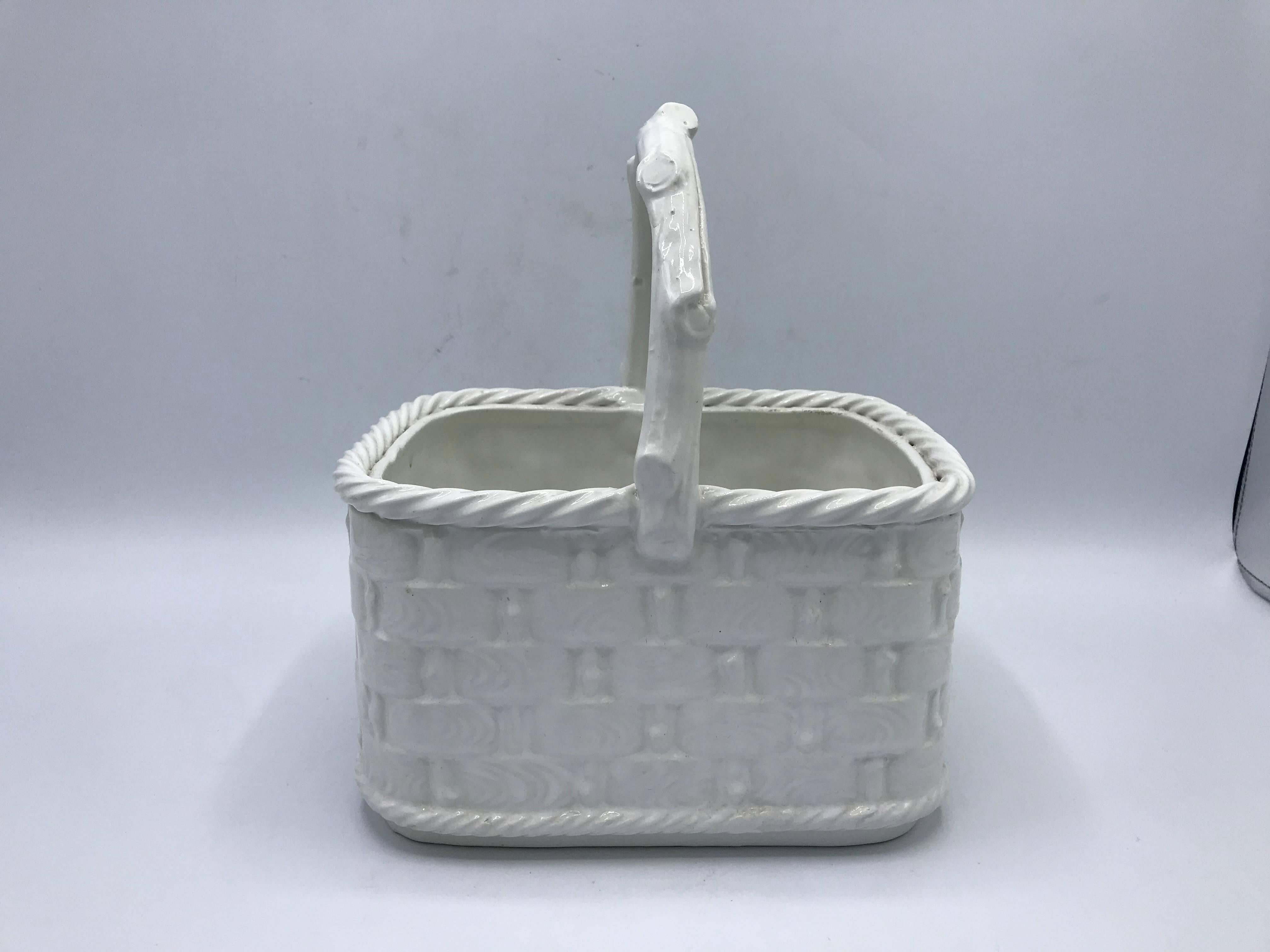 Offered is a stunning, 1960's Italian ceramic faux bois basket planter. The piece has a beautiful basketweave on all sides, with a faux bois motif. Marked 'Italy' on underside. 